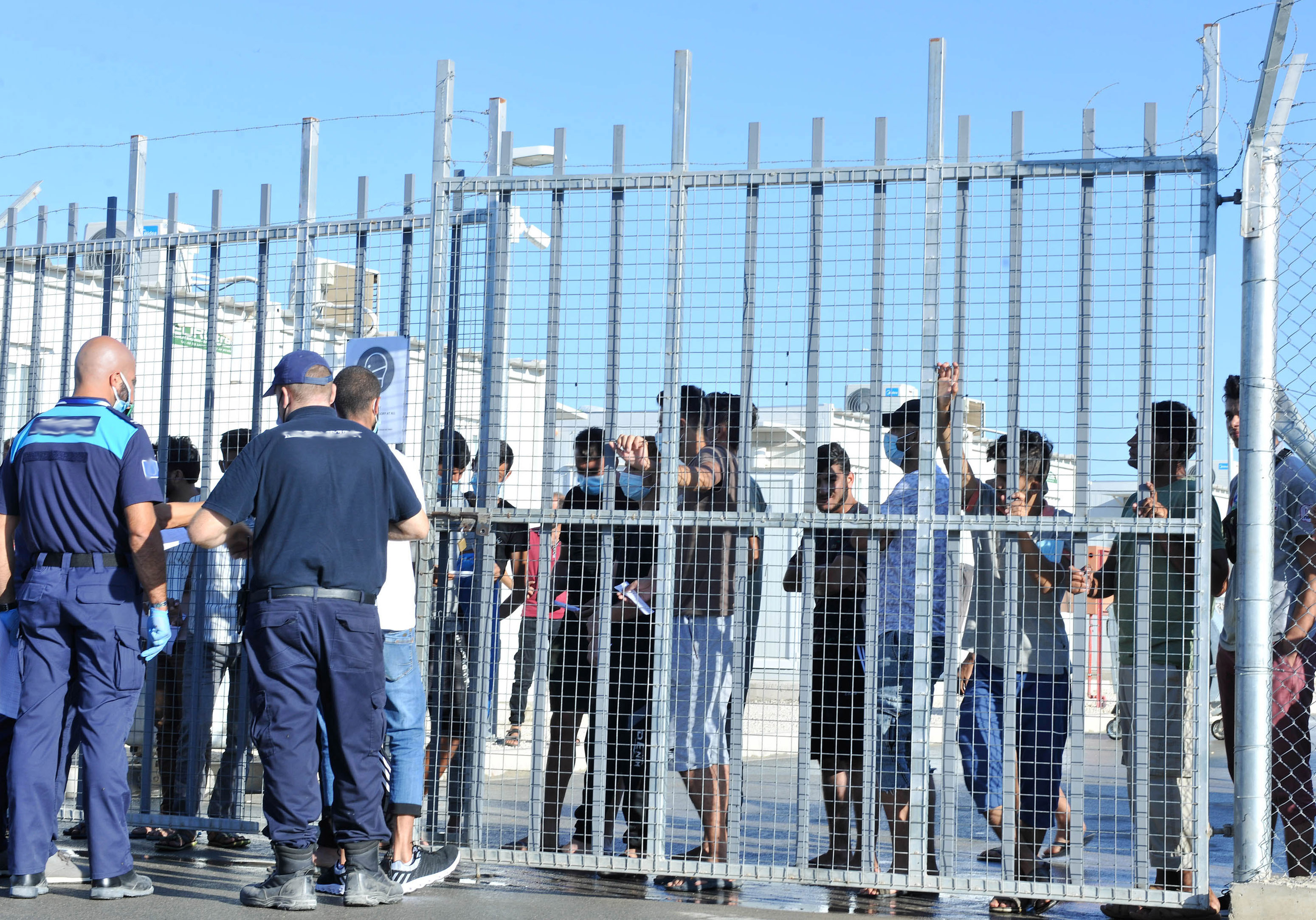 cover UN group concerned about private security staff in migrant centres