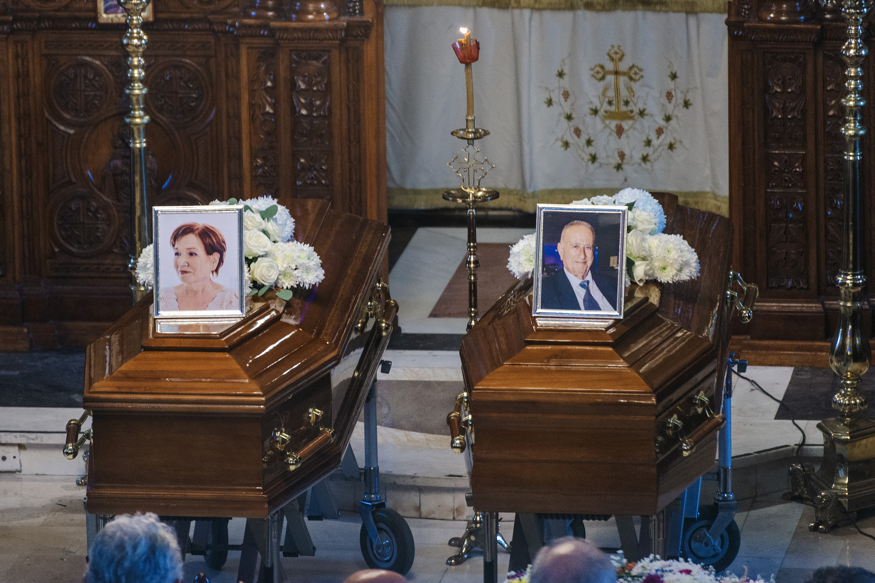 cover Funeral held for elderly couple killed in July 23 blaze
