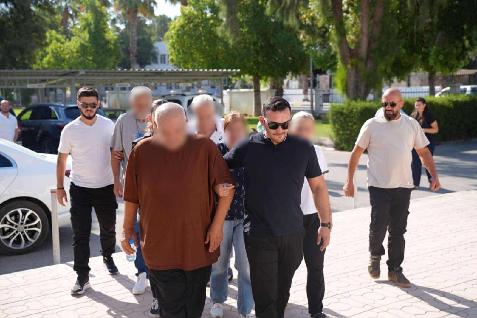 cover Greek Cypriots arresed in north to remain in custody for 13 more days