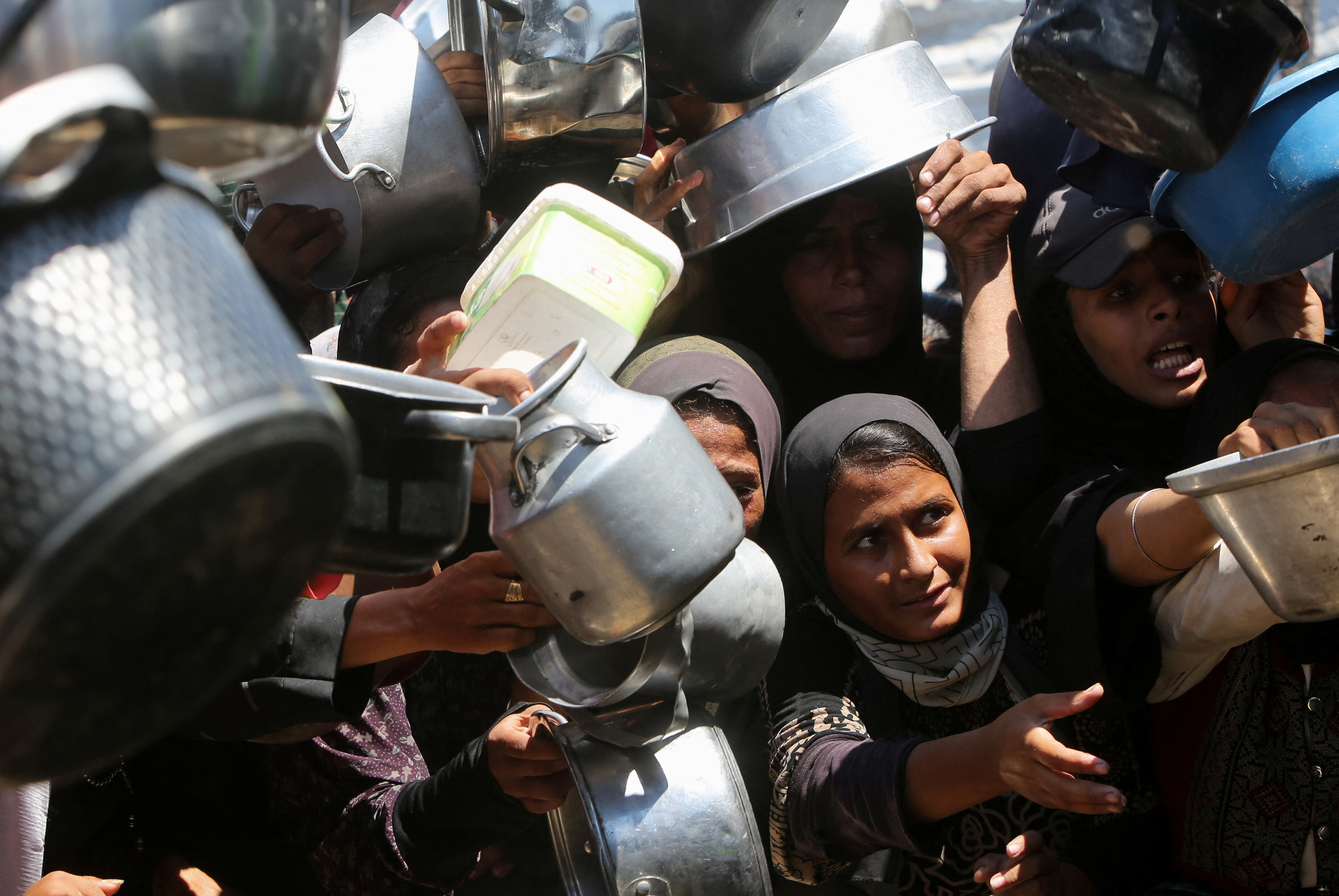 cover More Gazans die seeking aid and from hunger, as burial shrouds in short supply