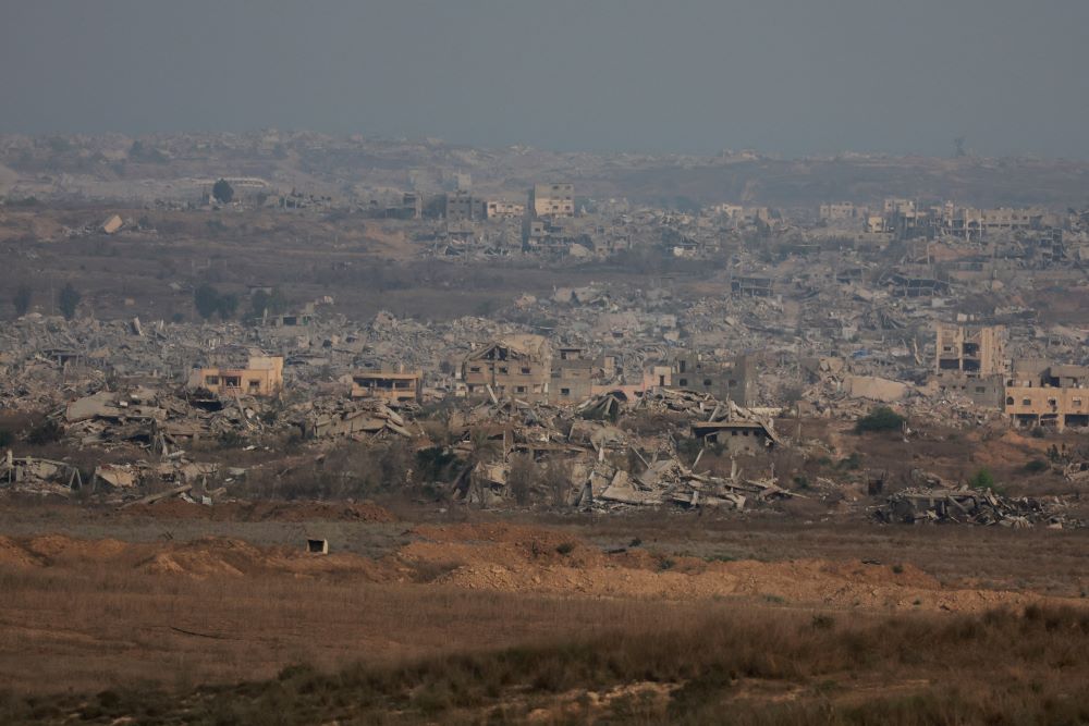cover Israel pounds Gaza City suburbs, vows to press on with offensive