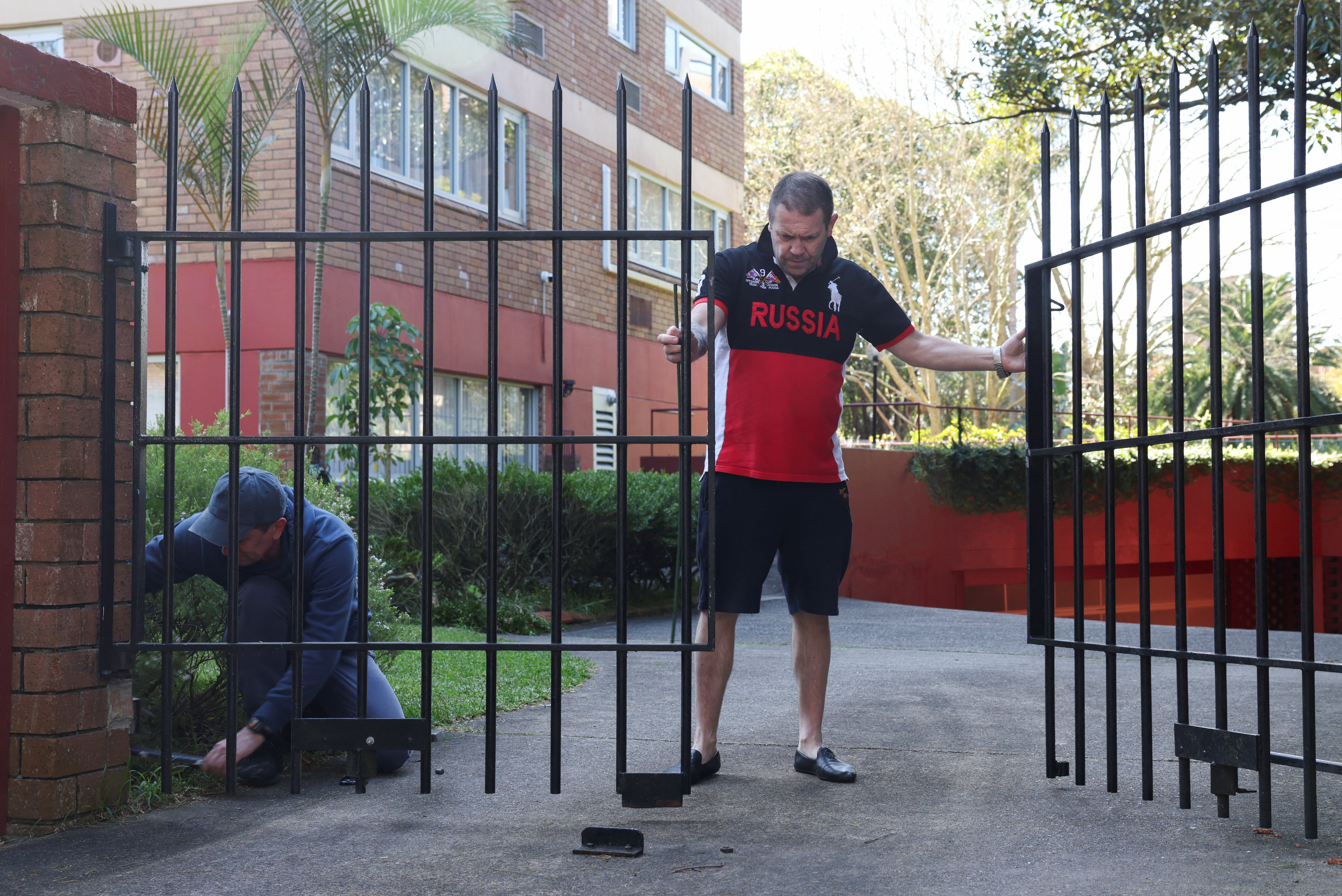 cover Man arrested for crashing car into Russian consulate in Sydney