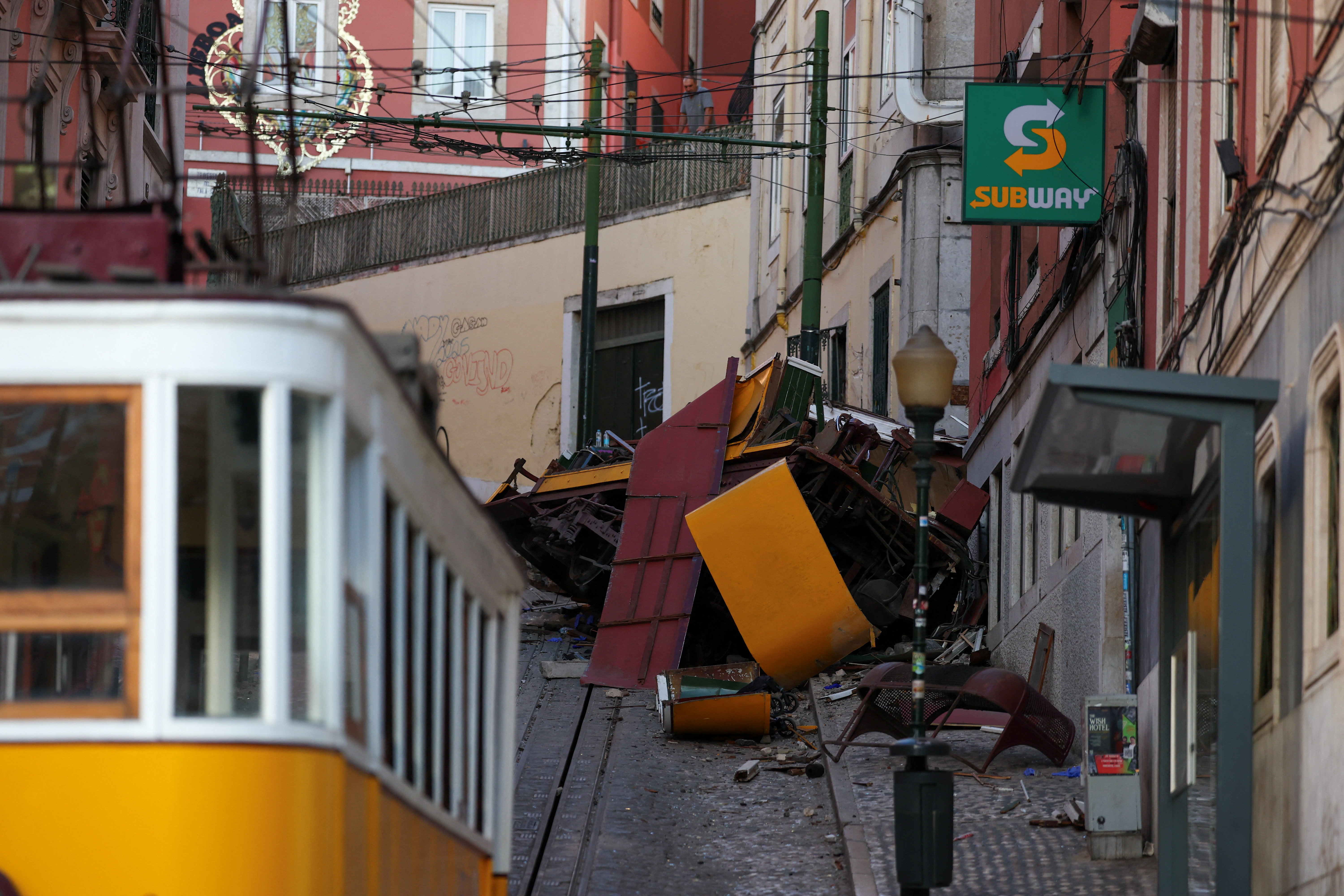 cover Lisbon mourns 16 victims of cable car crash as investigation begins