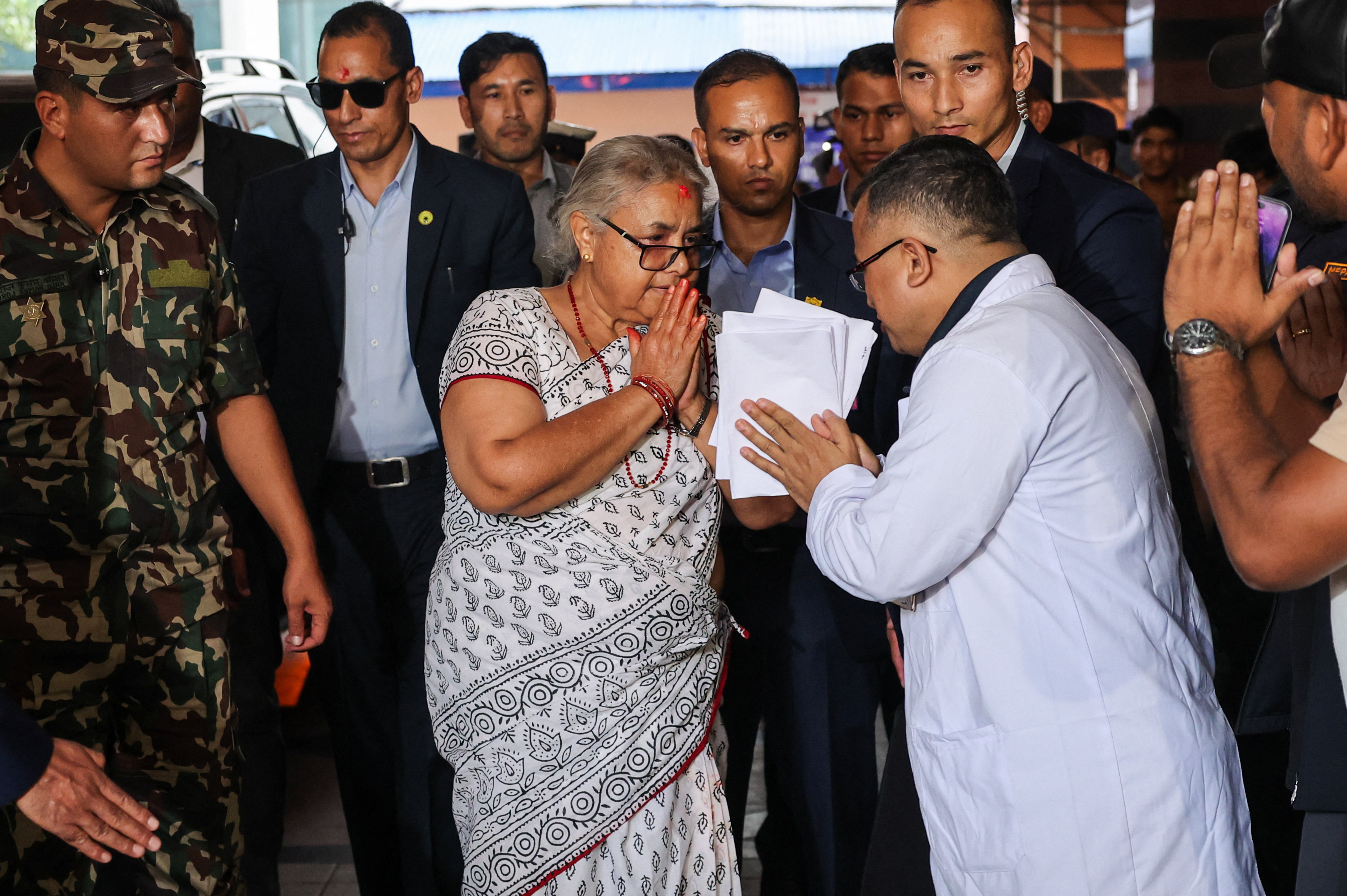 cover Nepal sets March elections after naming interim prime minister