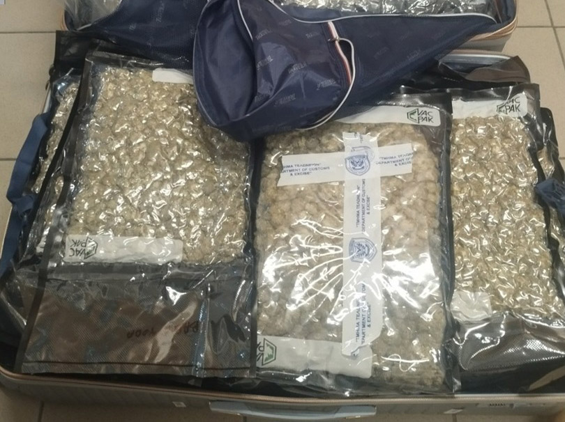 cover Remand after 24kg cannabis found in luggage