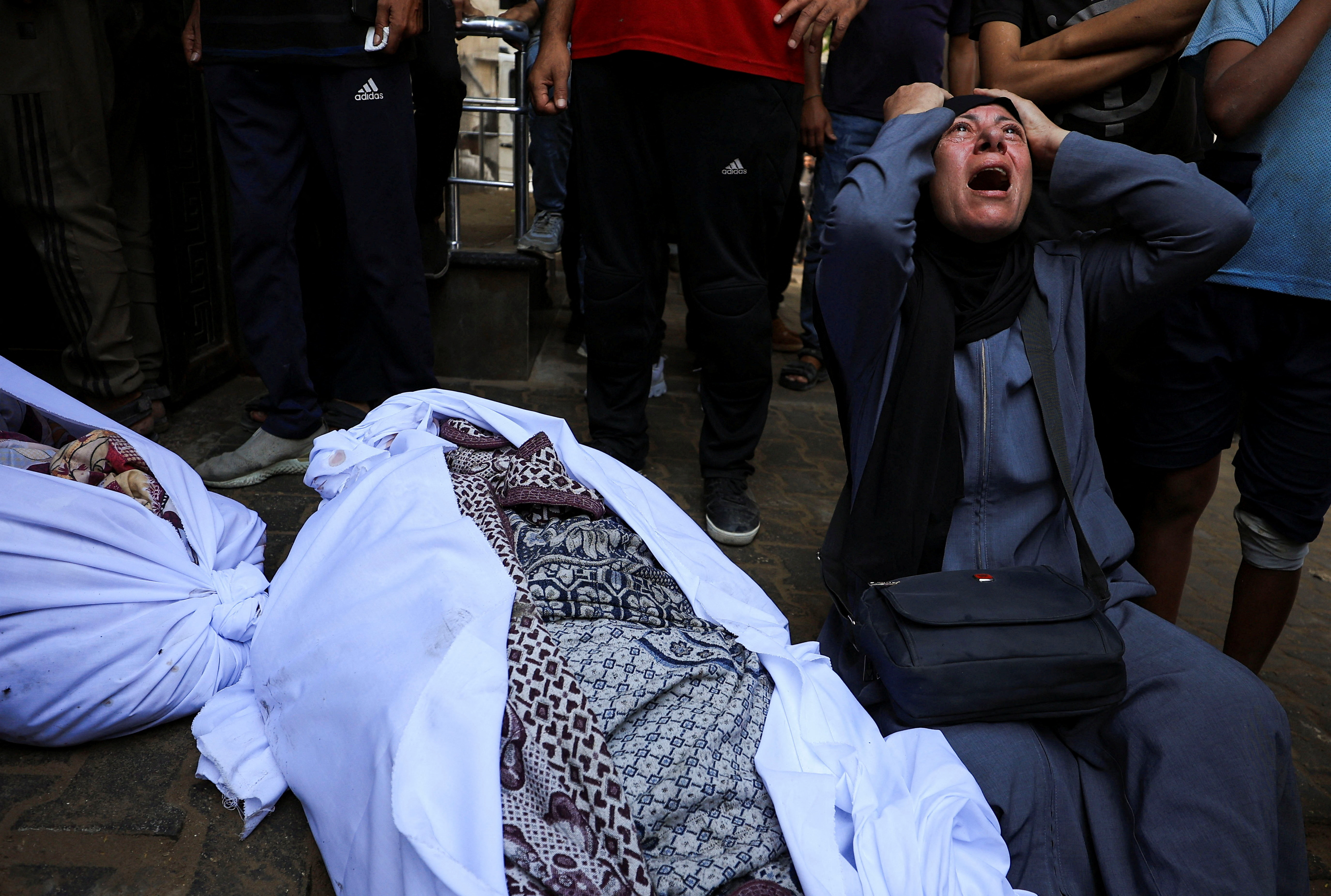 cover Israeli military urges Gaza City residents to leave, bombs high-rise tower