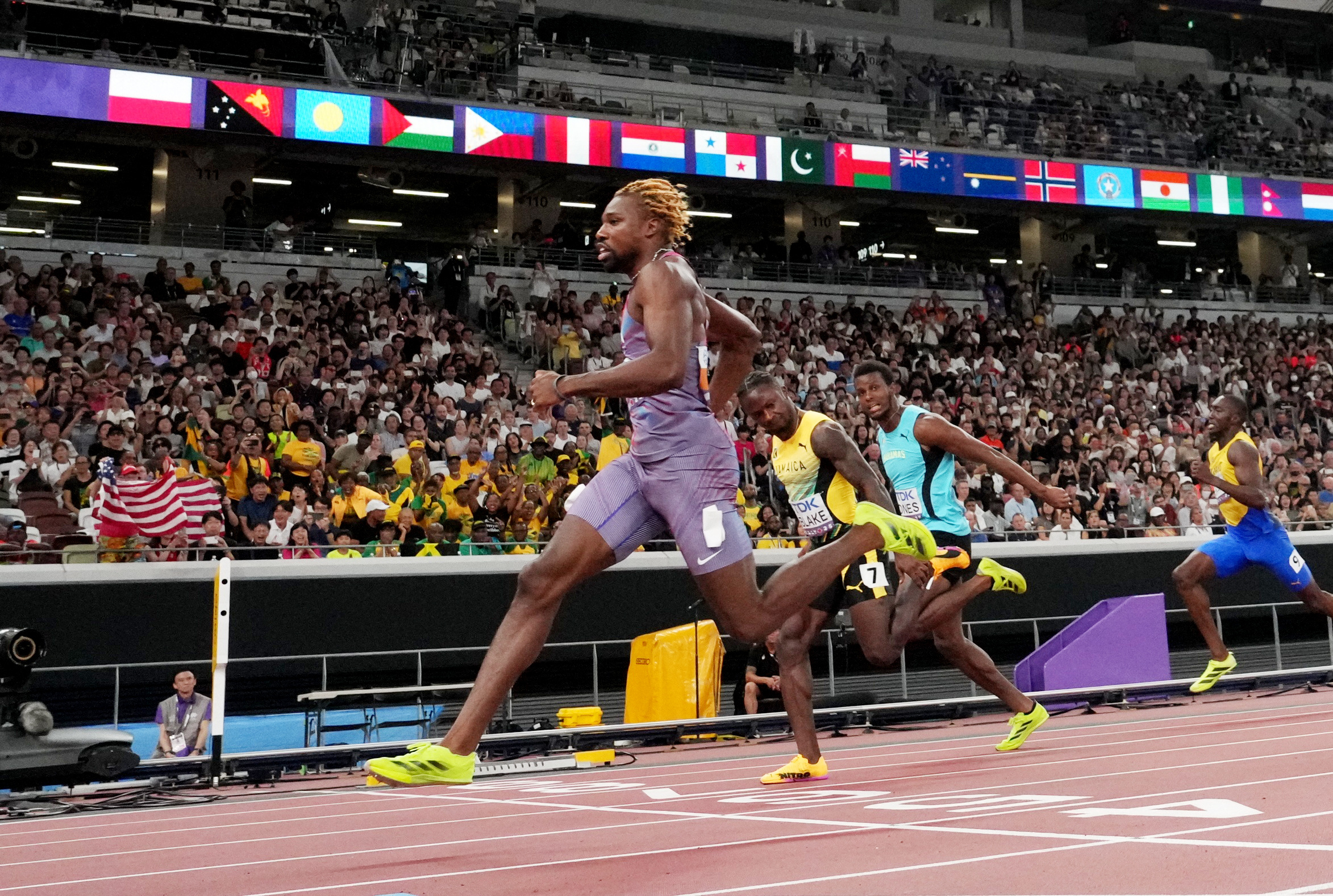 cover Lyles and Thompson keep apace in world championship heats