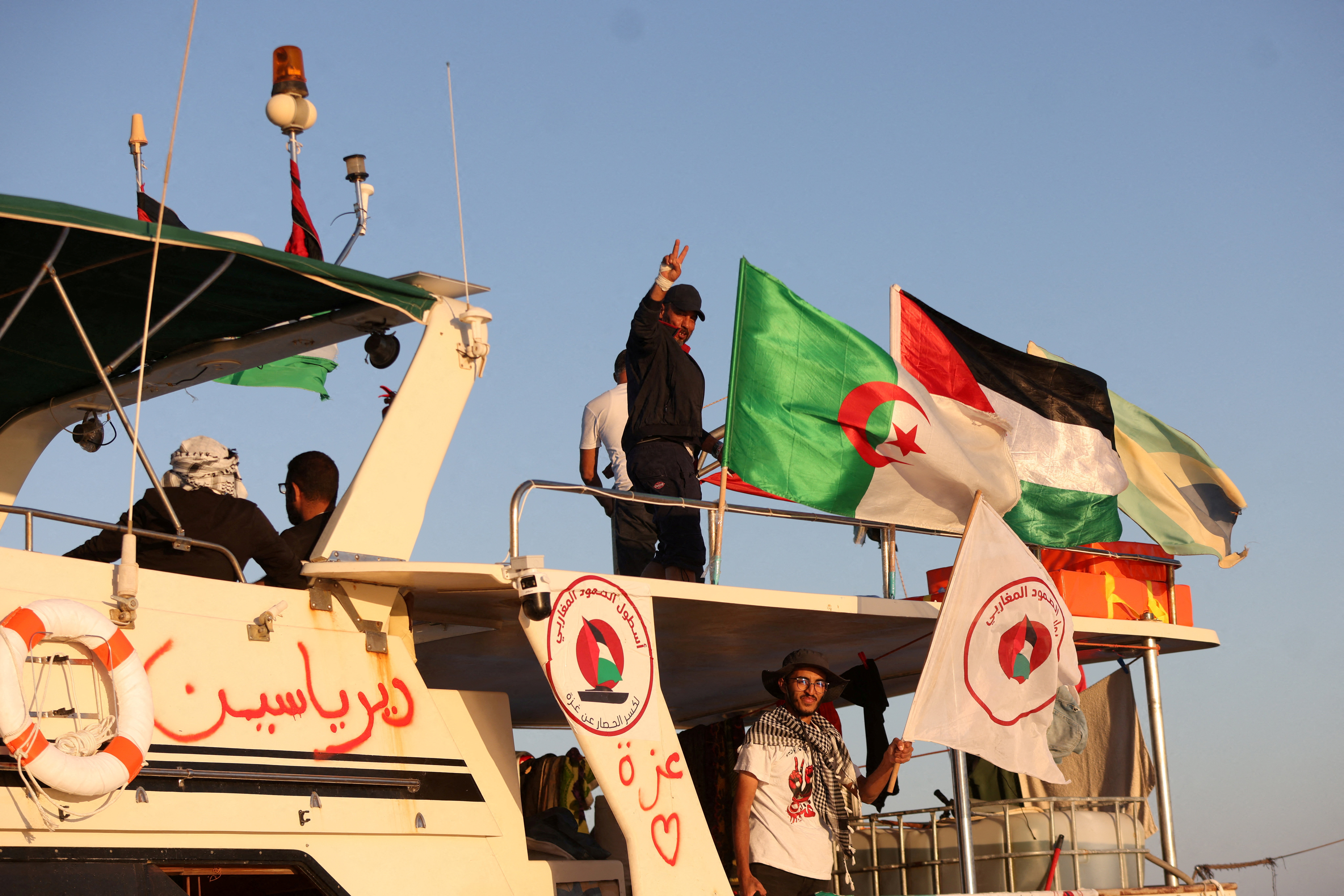 image Gaza flotilla says Israeli vessels intimidated its boats as it nears blockade