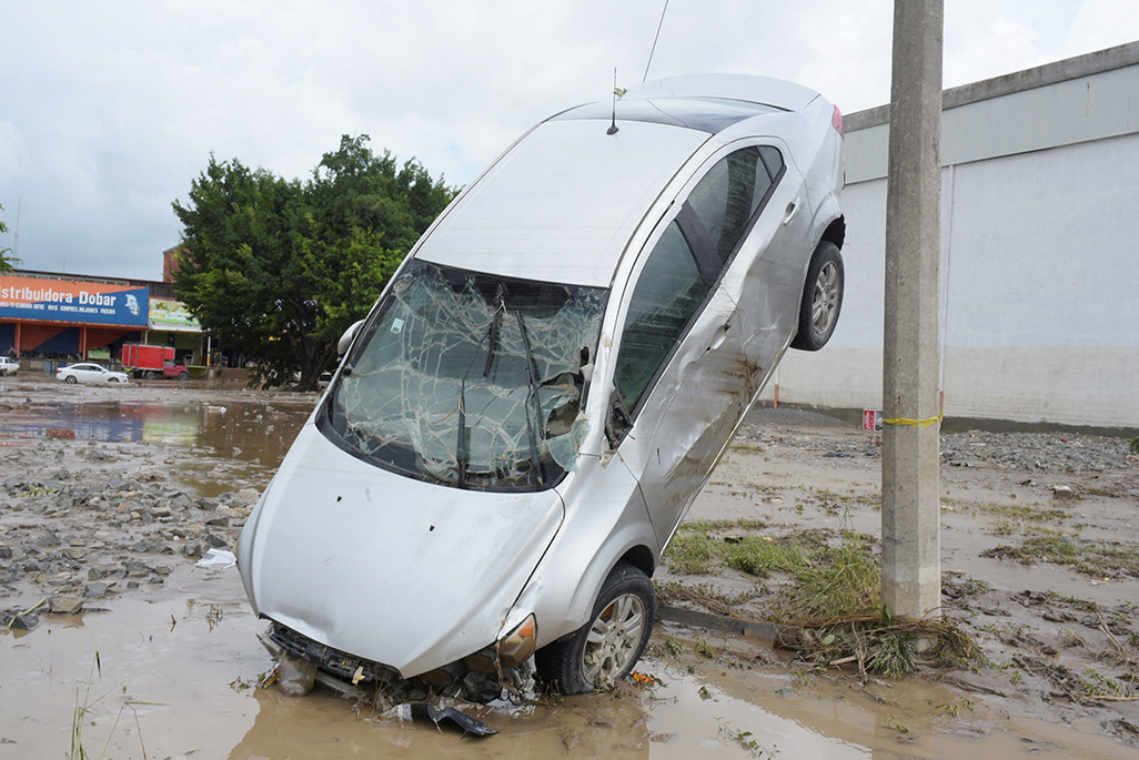 cover Torrential rains, flooding leave at least 64 dead, dozens missing in Mexico