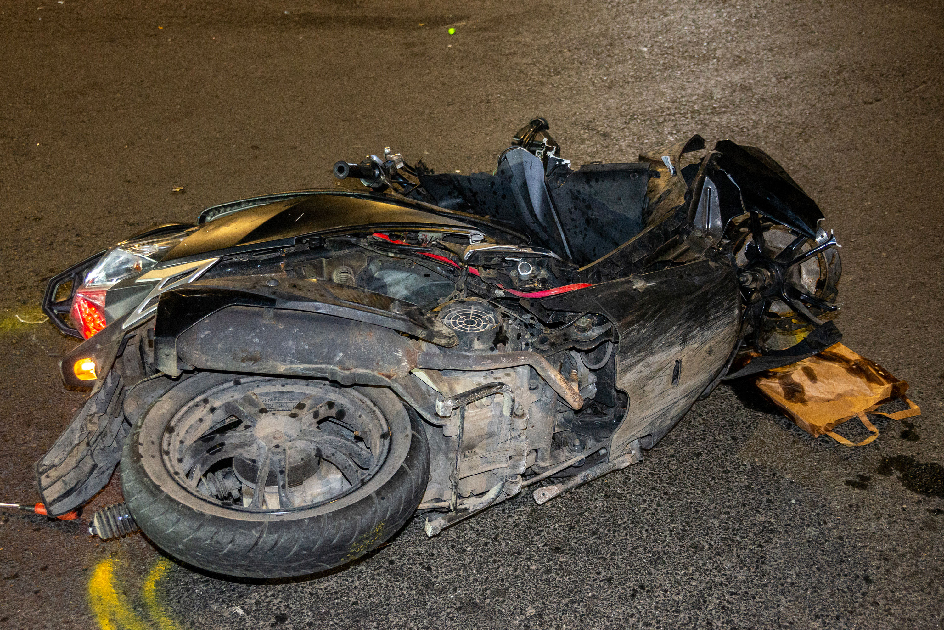 cover Teen motorcyclist died of multiple injuries