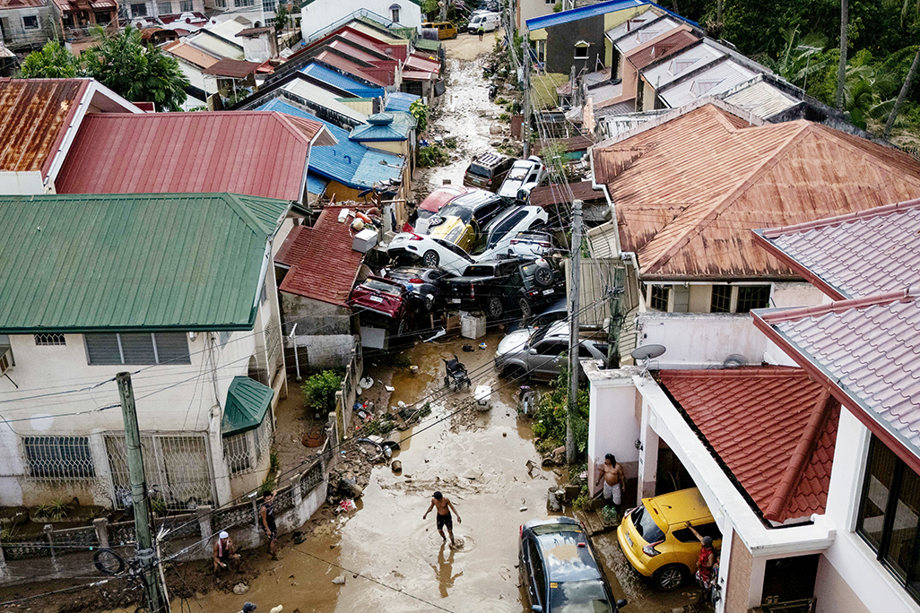 cover Typhoon death toll climbs to 66 as Philippine survivors confront destruction