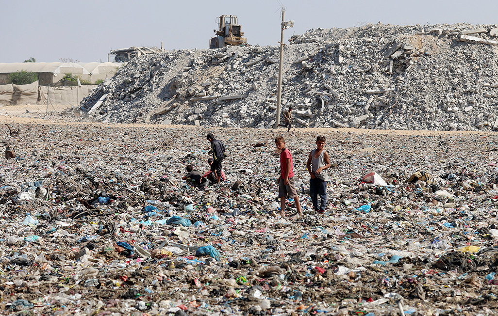 cover Piles of garbage and seeping sewage pollute devastated Gaza