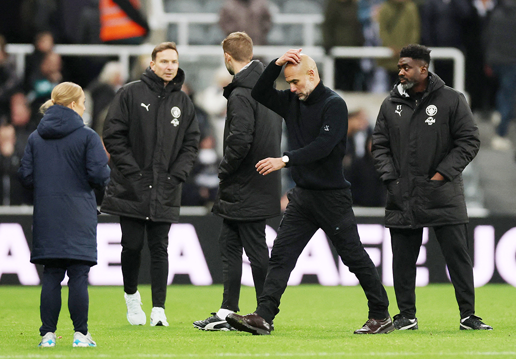 image Man City&#8217;s Guardiola apologises for confrontation with cameraman