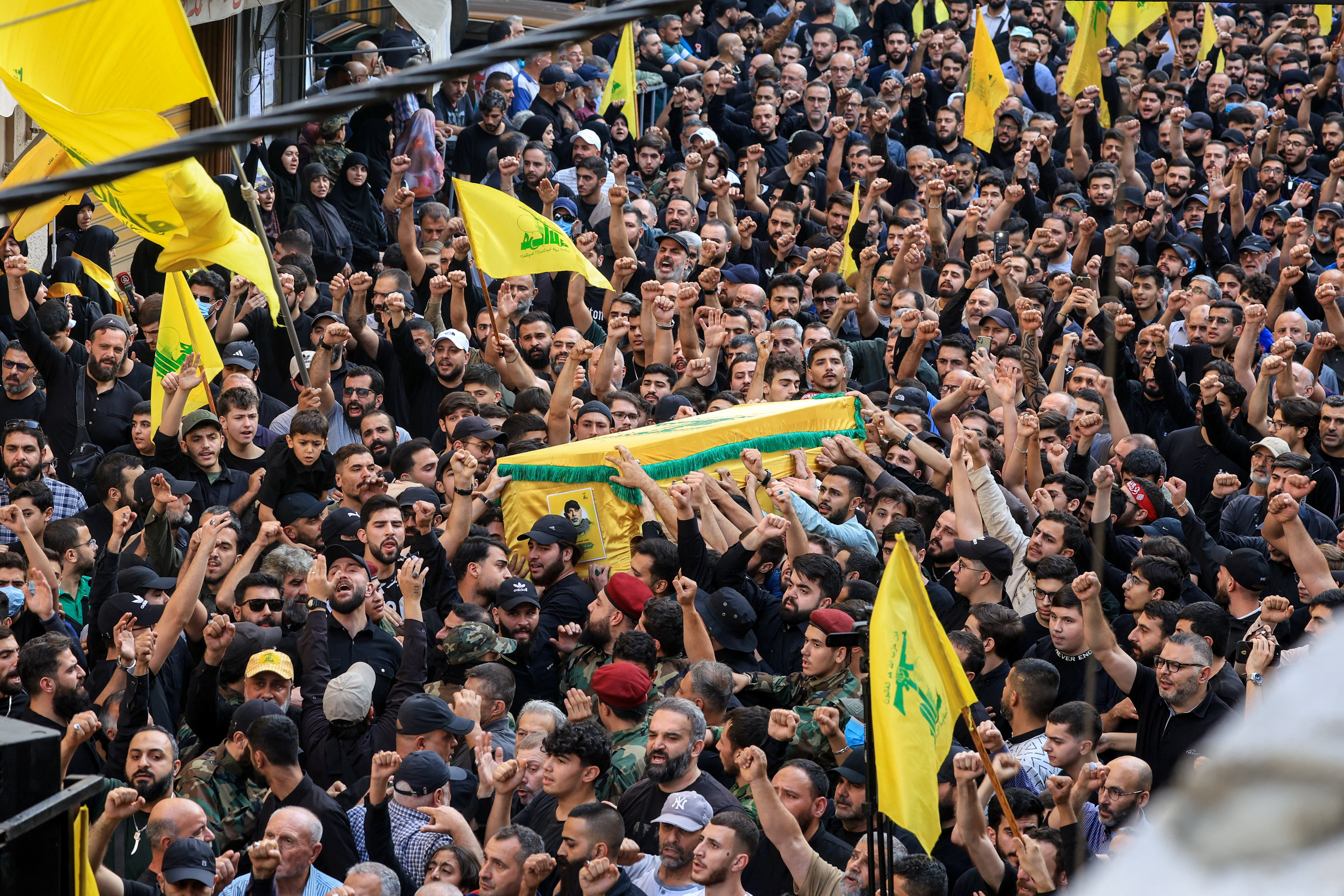 image Crowds in Beirut suburbs mourn Hezbollah commander slain by Israel