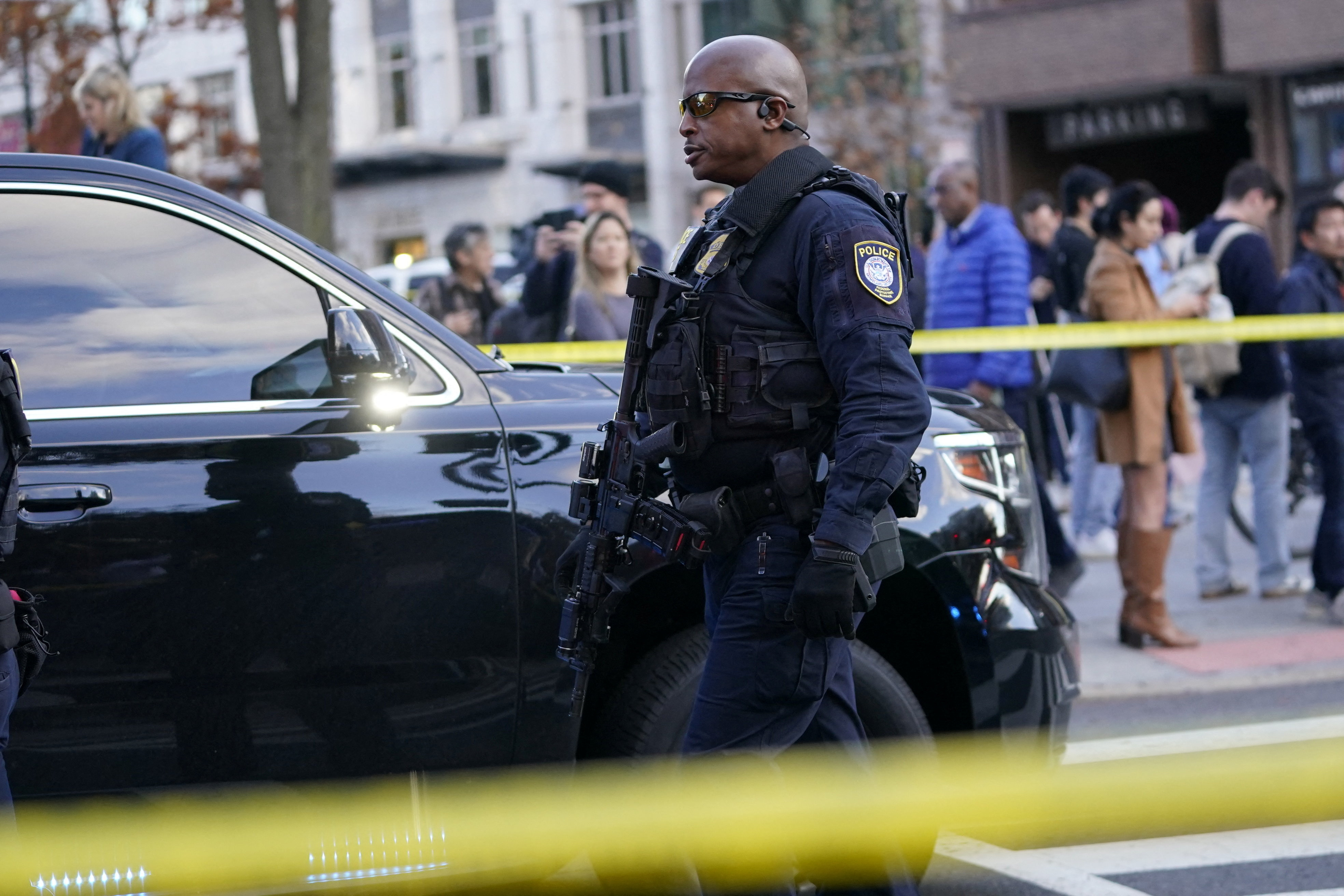 cover Two National Guard members shot near White House, with Trump in Florida