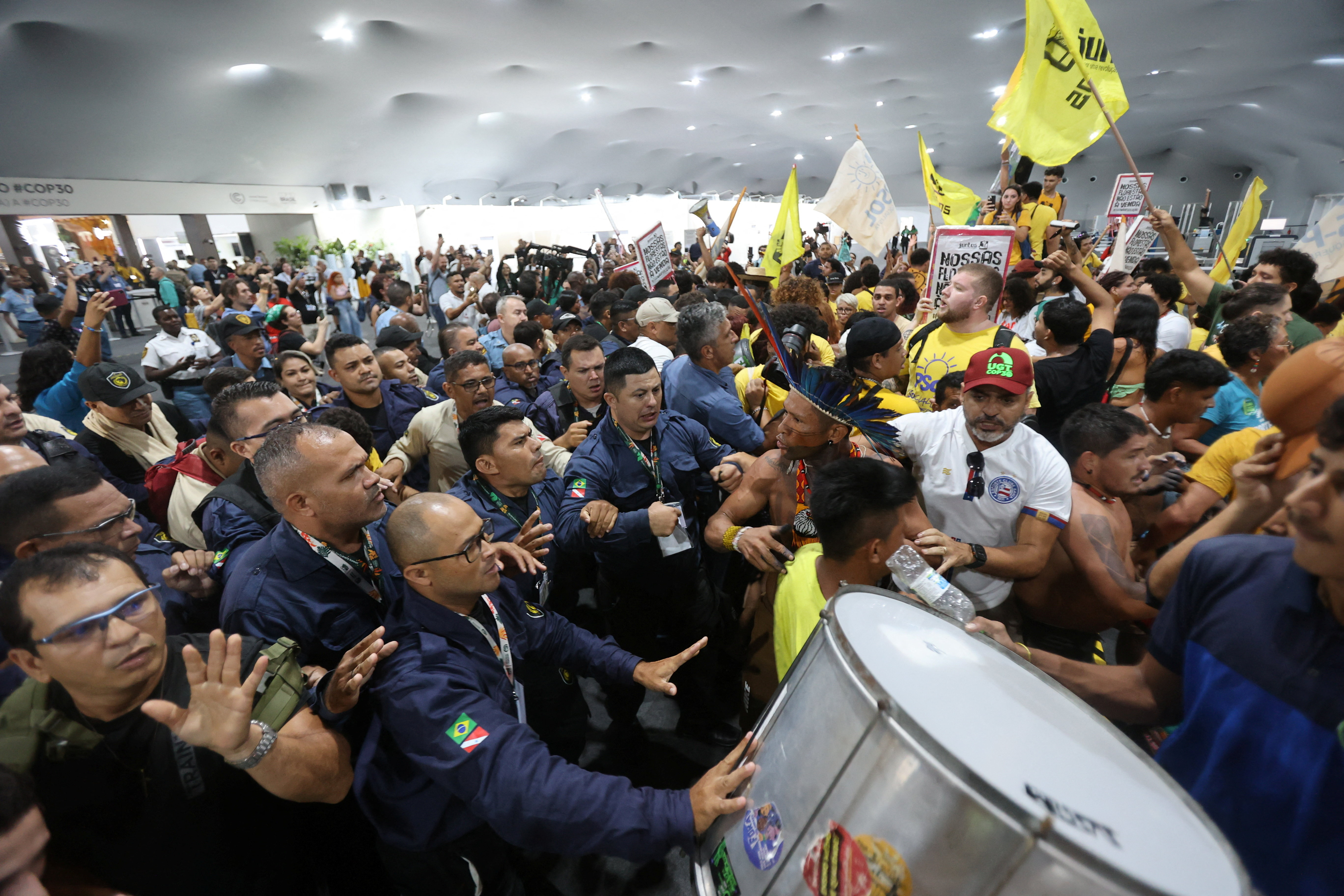 cover Protesters force their way into COP30 summit venue, clash with security