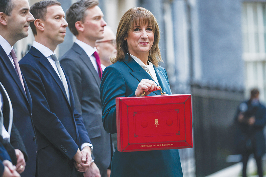 cover UK Chancellor hikes taxes in budget plan to boost fiscal buffer