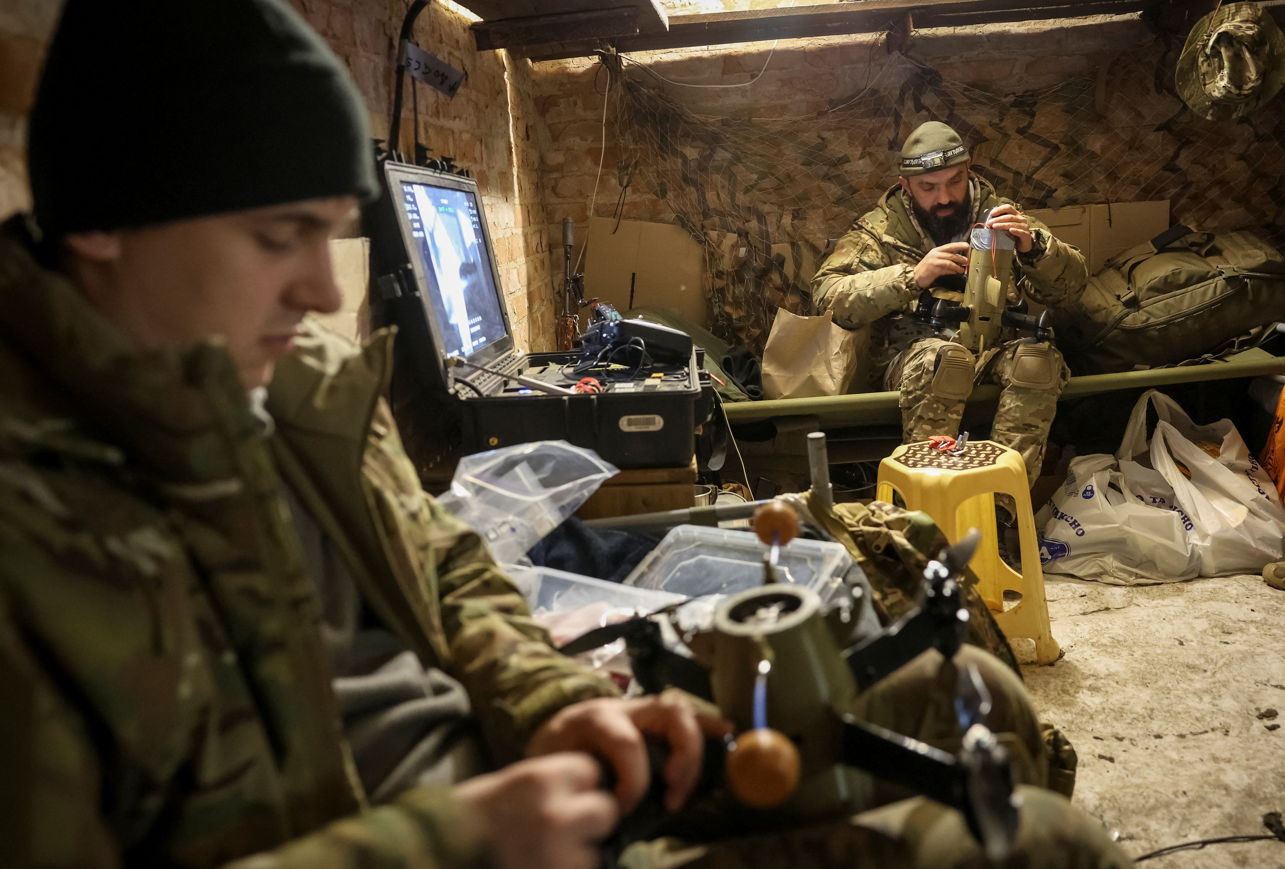 cover Ukraine says its troops still holding out in Pokrovsk as Moscow says pincer closing