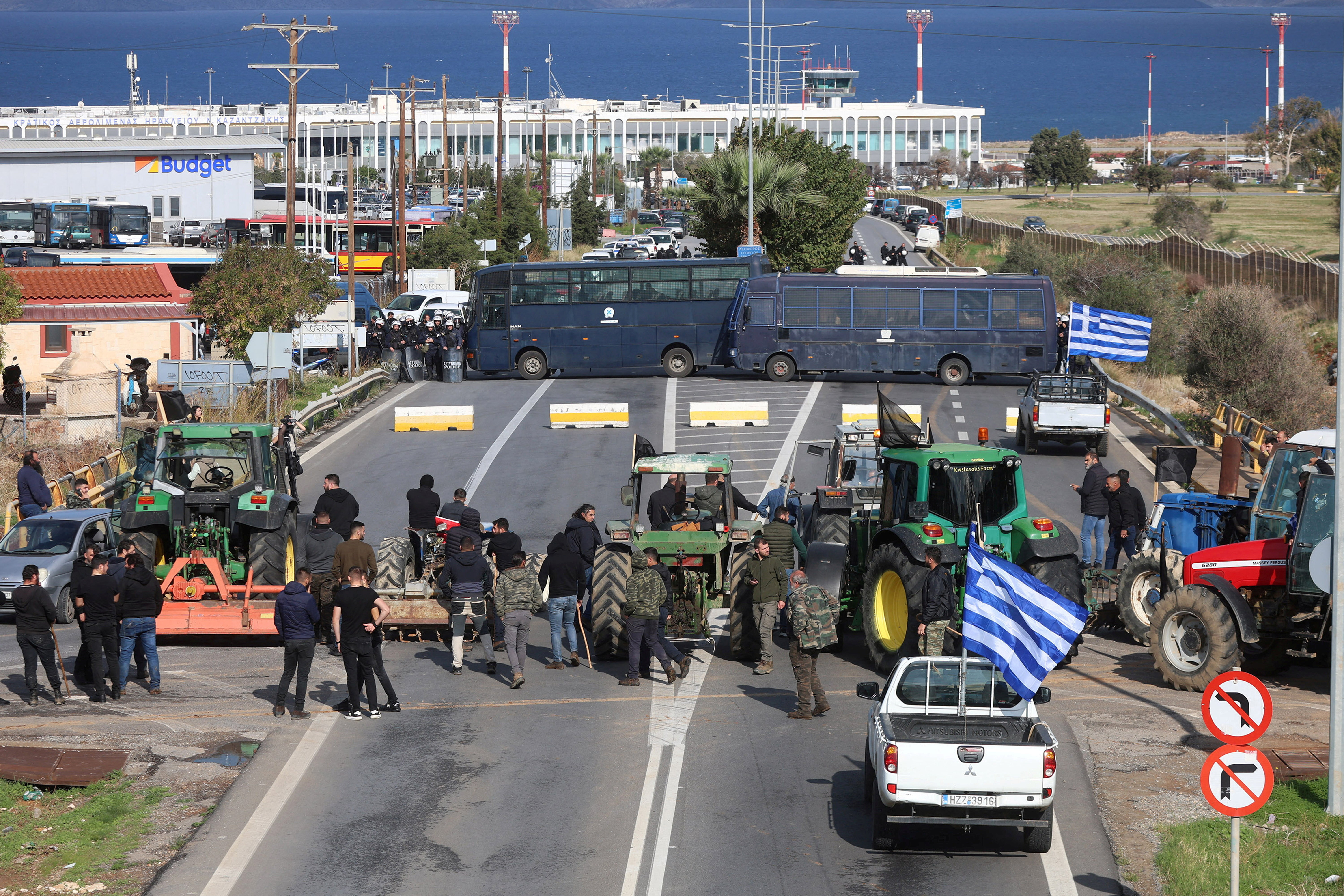 cover Greek farmers block borders, airport and roads in protest at delayed EU farm subsidies