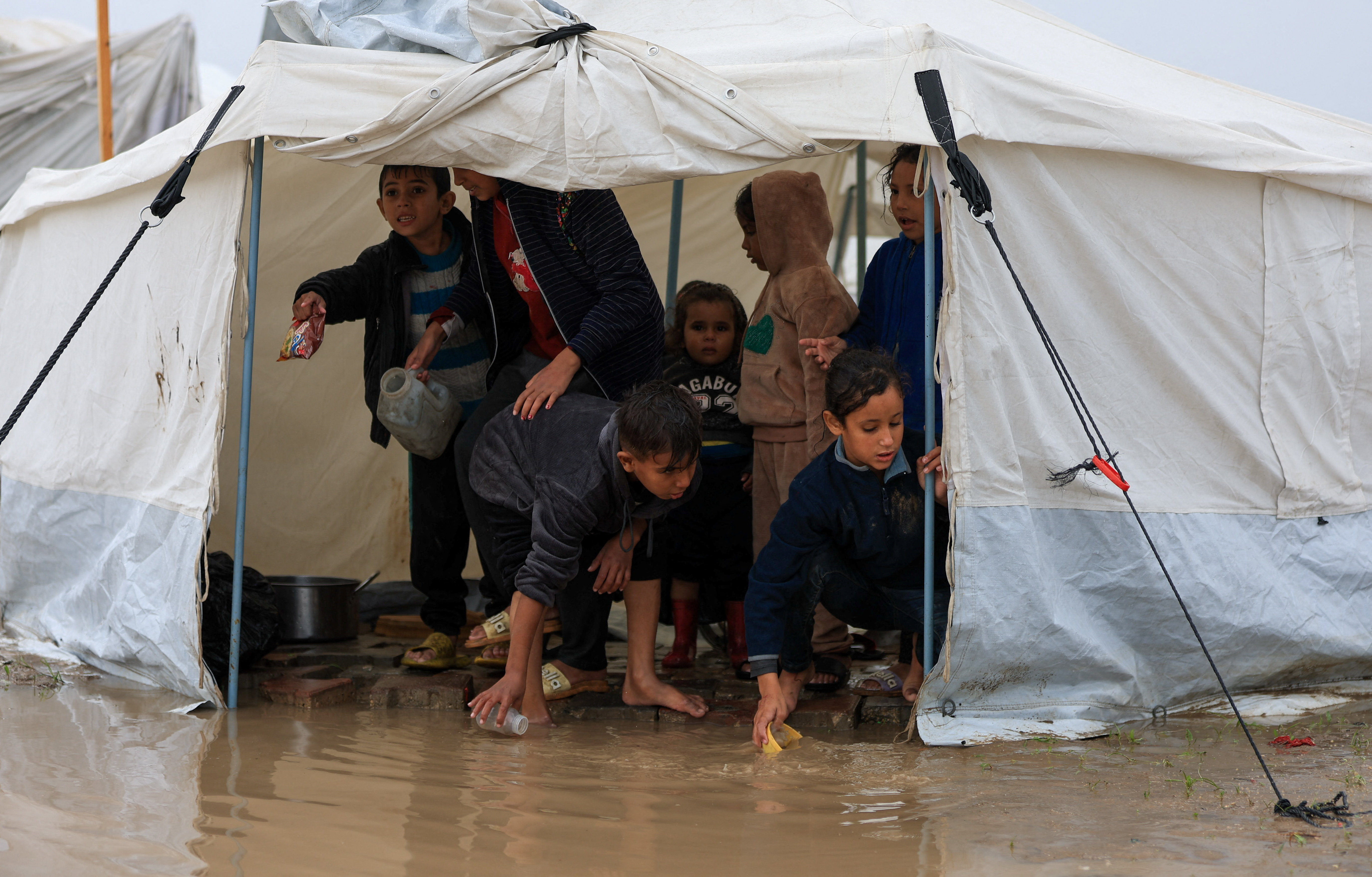 image Torrential rain flooded Gaza tents and a baby died of exposure, medics say