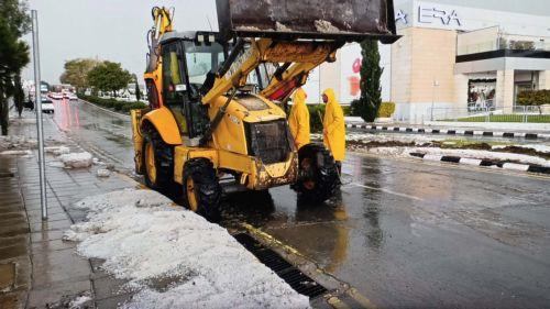 cover Paphos EOA handling situation after heavy rain and hail