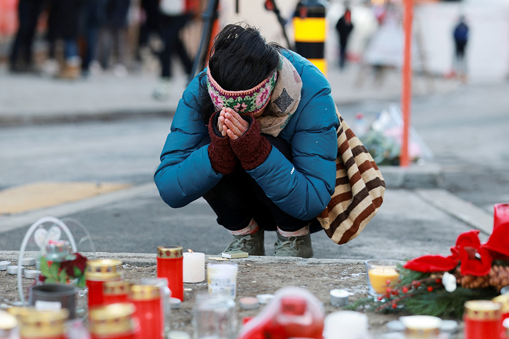 cover Swiss face painful task of identifying victims of deadly bar fire