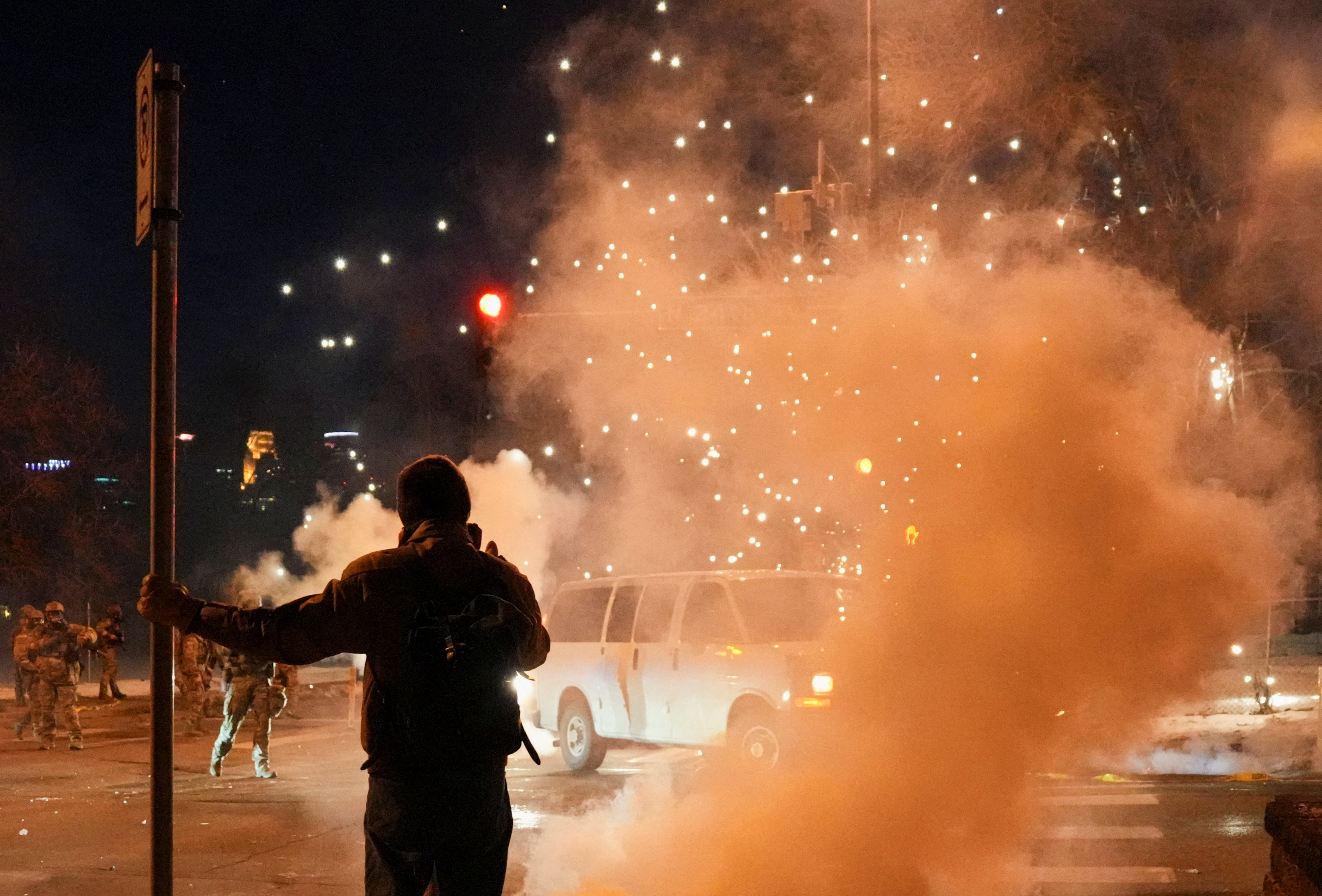 cover Another immigration-related shooting fuels chaos in Minneapolis