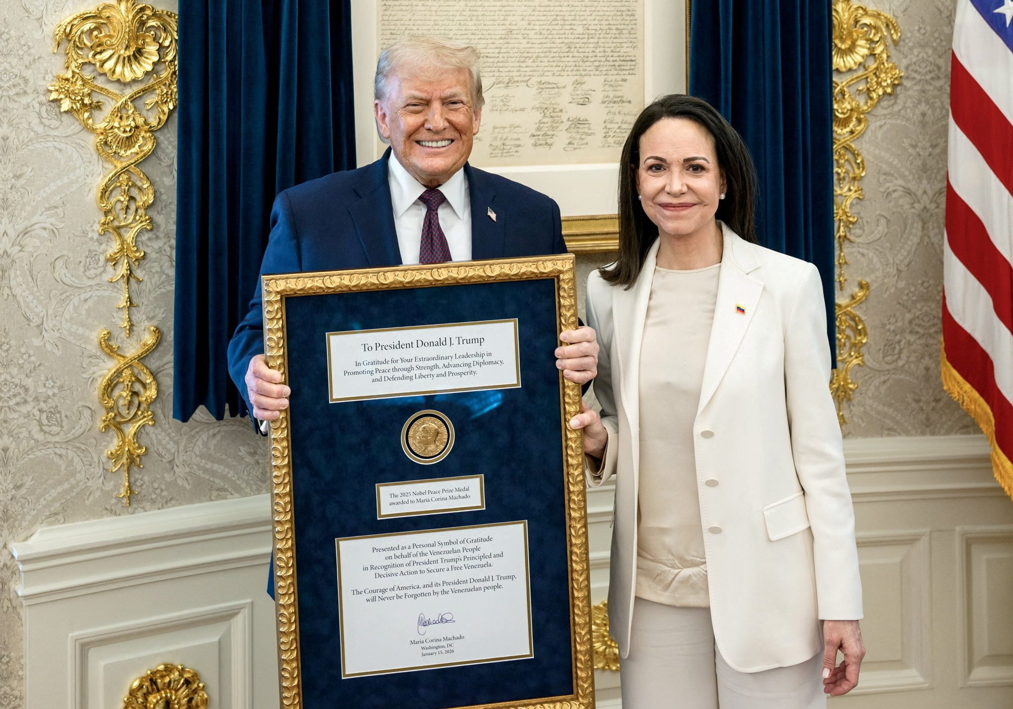 cover Trump accepts Nobel medal from Venezuelan opposition leader Machado