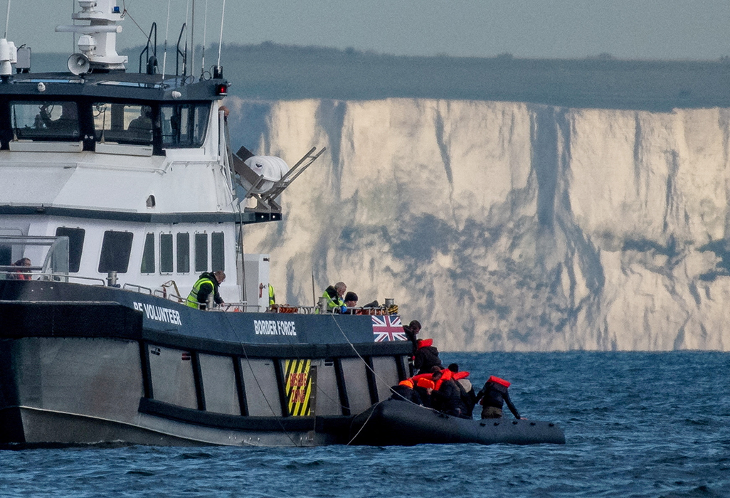 cover Rwanda seeks £100m from UK over axed asylum deal