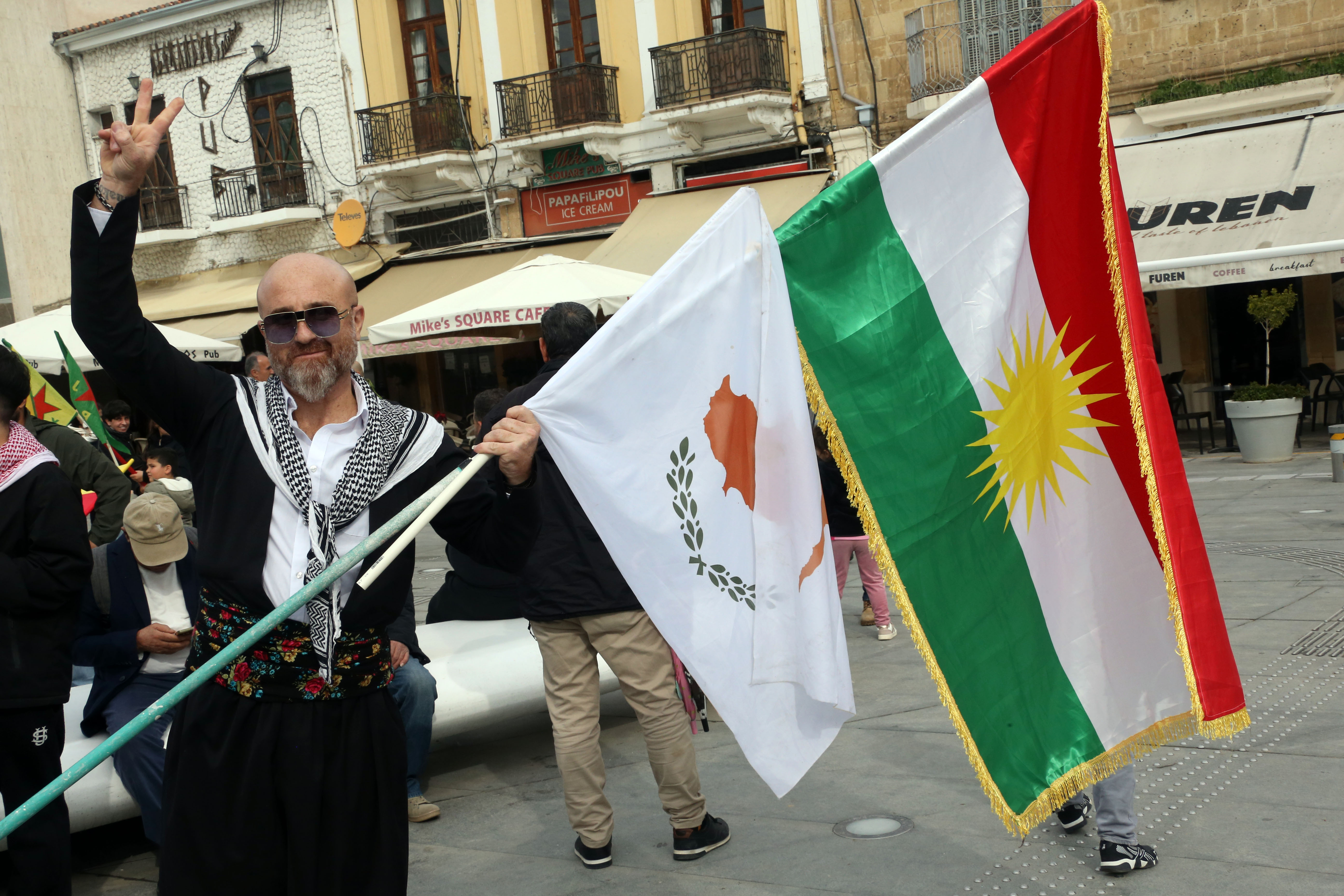 cover Kurds march in Nicosia as parliament set to vote on Rojava resolution