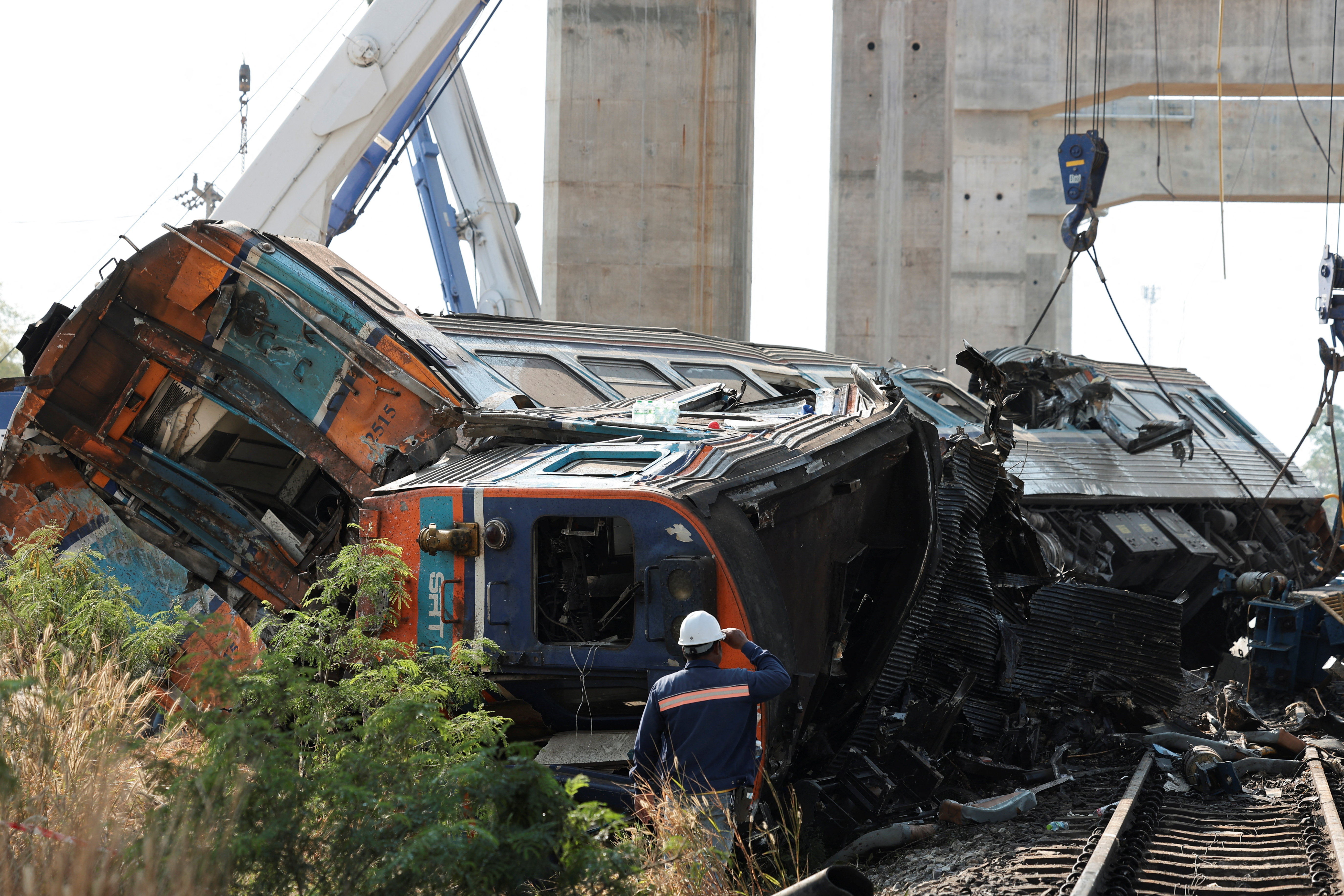 cover At least 25 killed after crane falls on train in Thailand, police say 