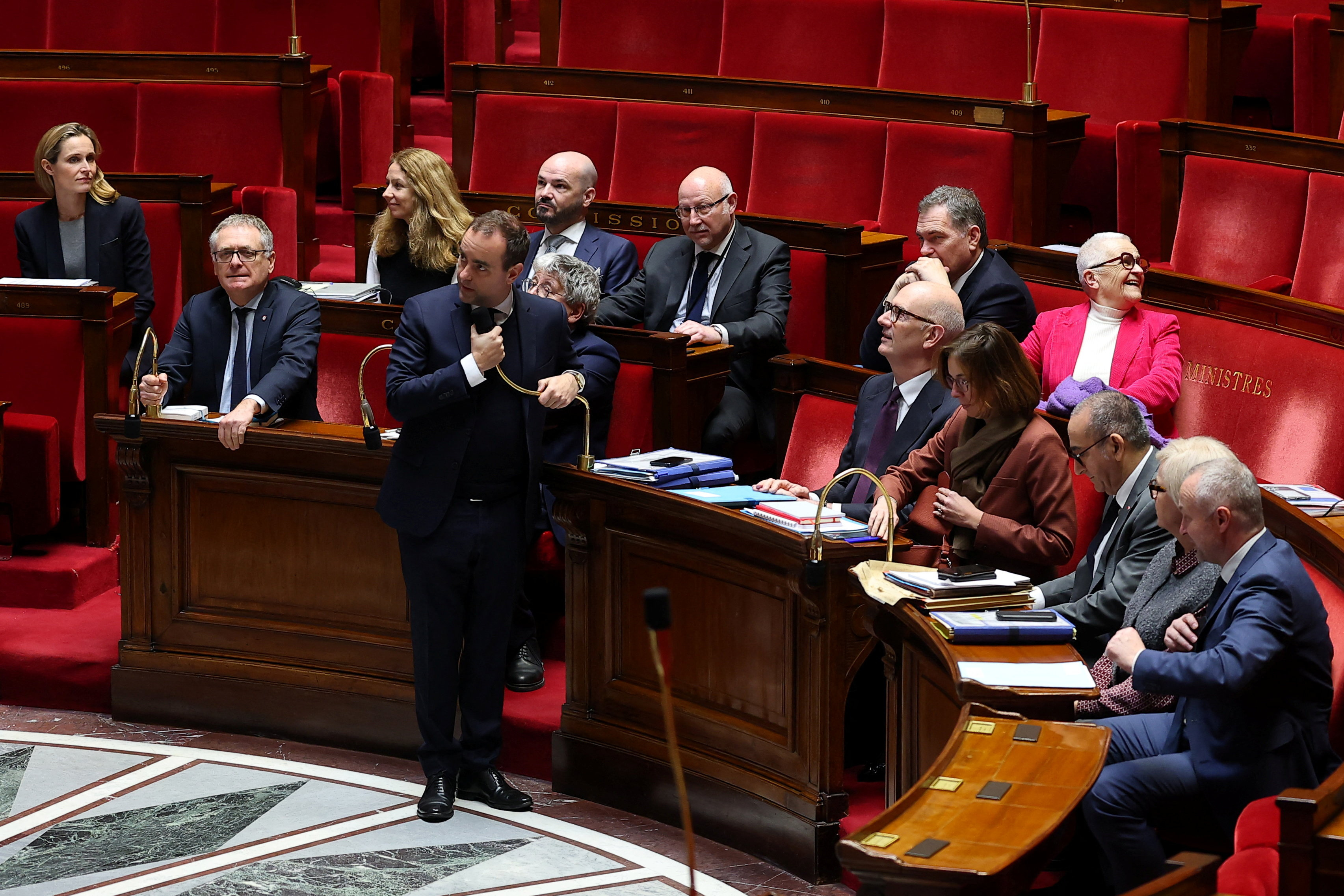 image French government survives no-confidence votes over budget