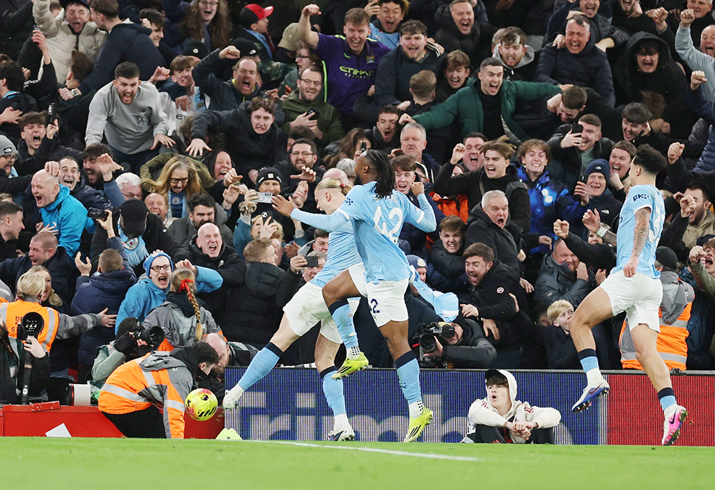cover City snatch chaotic win at Liverpool to stay on Arsenal&#8217;s heels