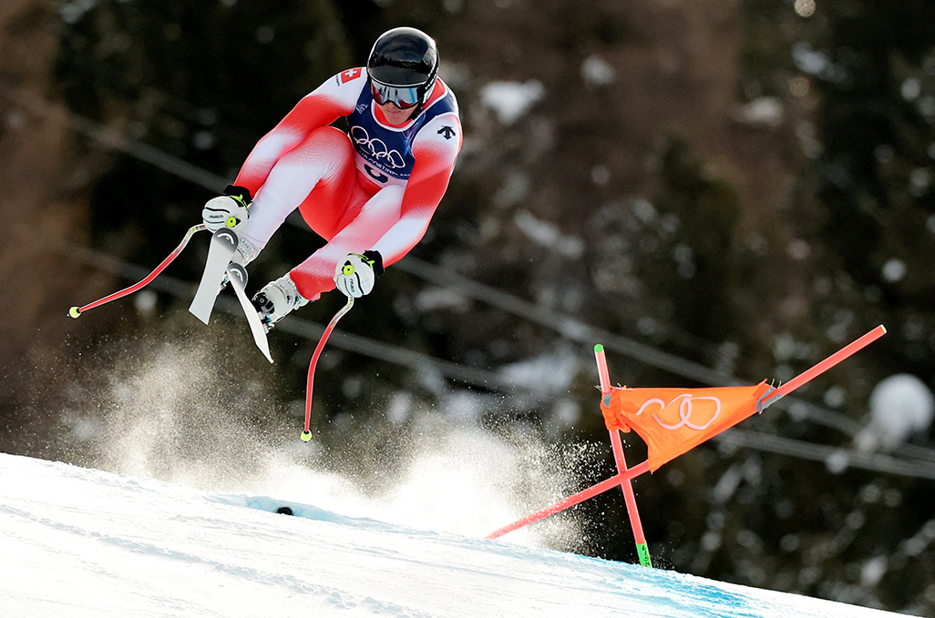 cover Von Allmen wins first gold of the Games in downhill