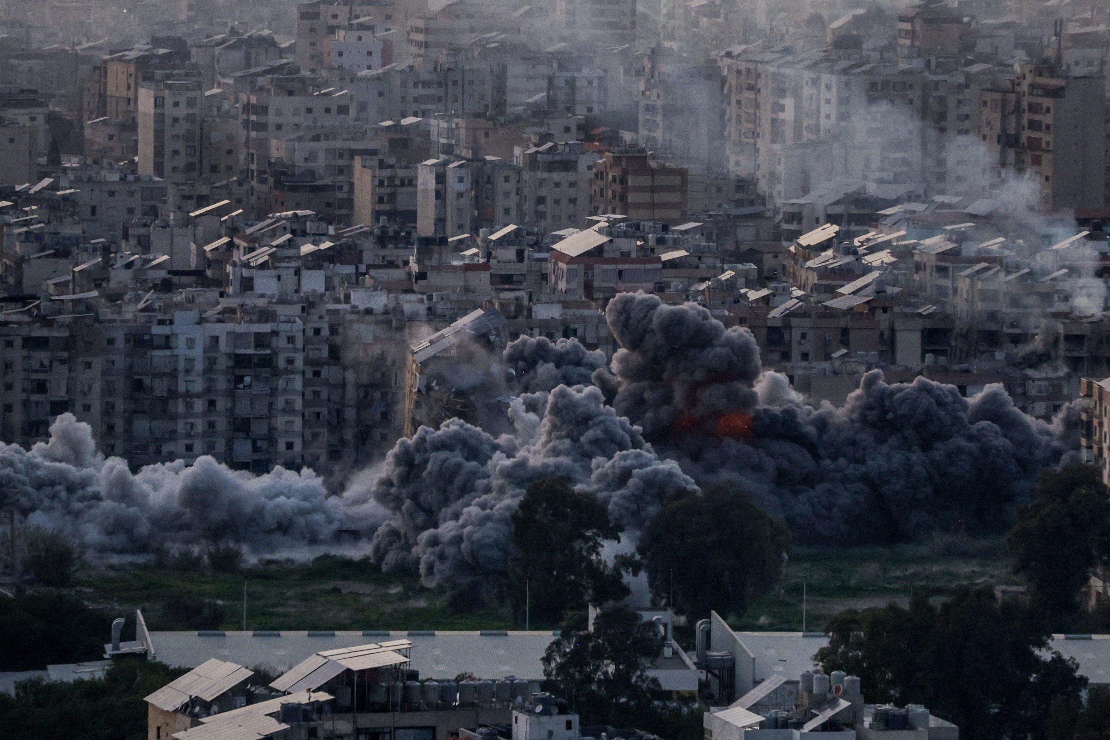 cover Israeli airforce pounds Beirut, Lebanon death toll rises