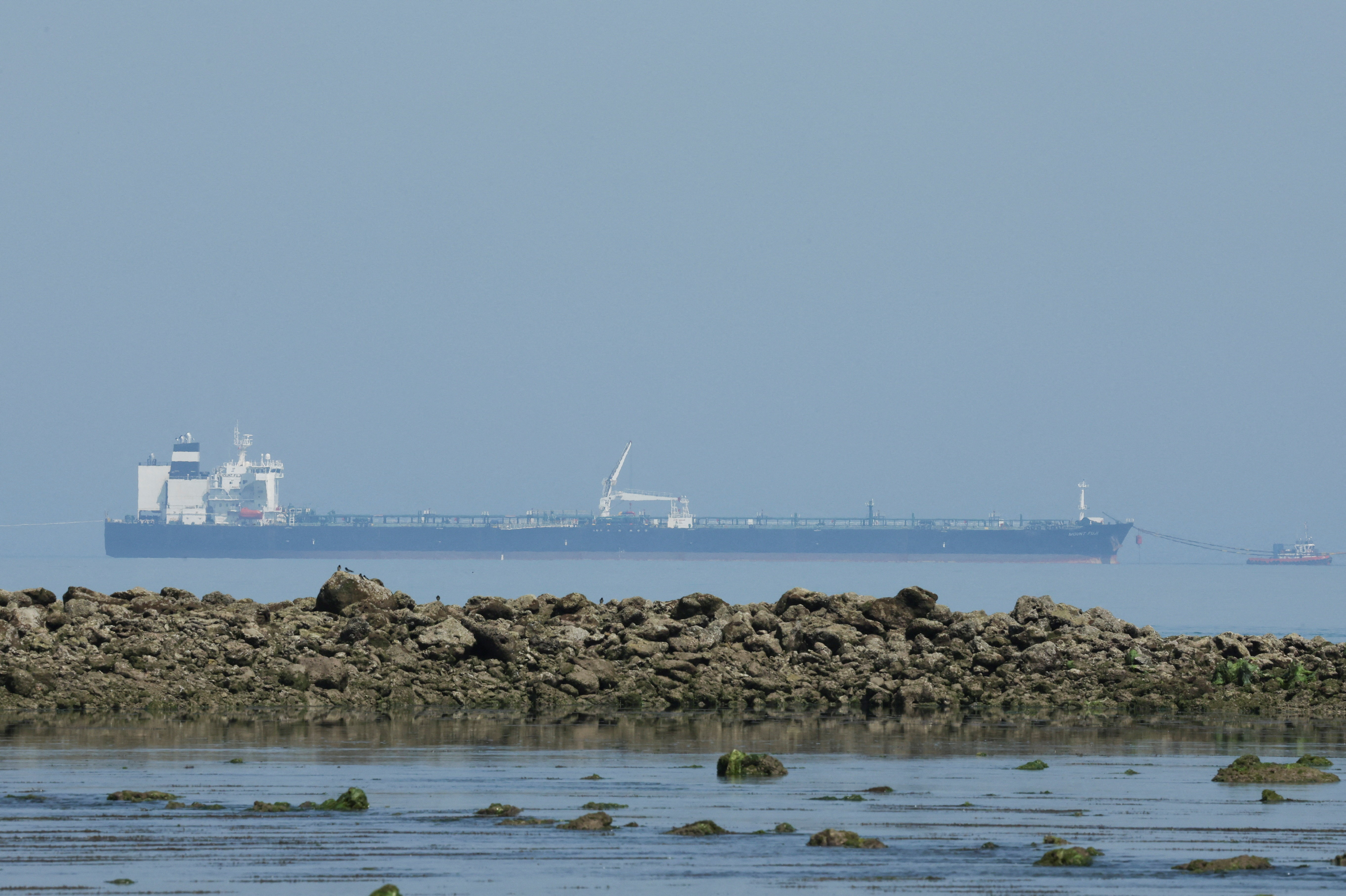 cover US issues 30-day sanctions waiver for purchase of Russian oil at sea