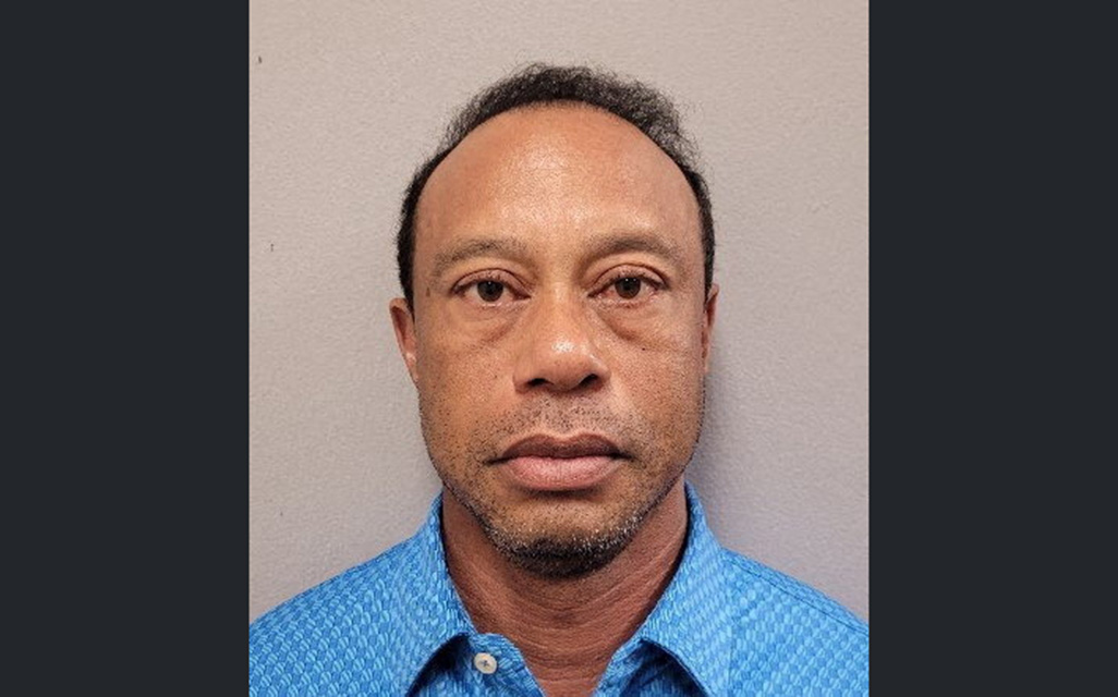 cover Tiger Woods out on bail after arrest on suspicion of DUI