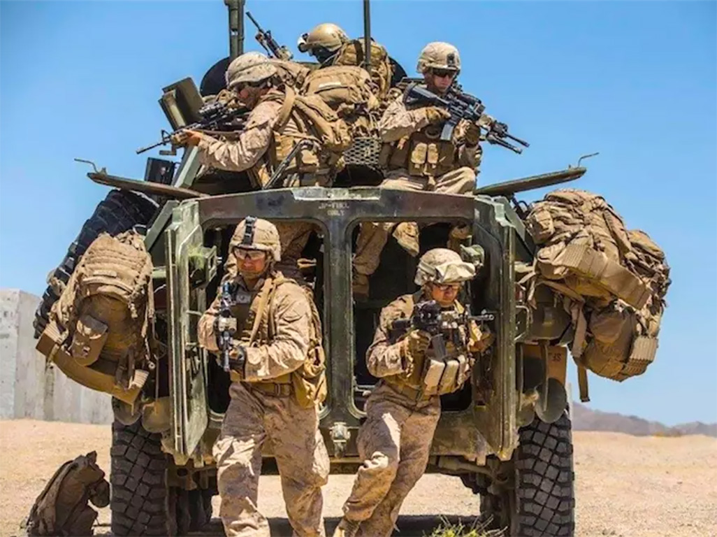 cover US sending Marines and amphibious assault ship to Middle East, officials say