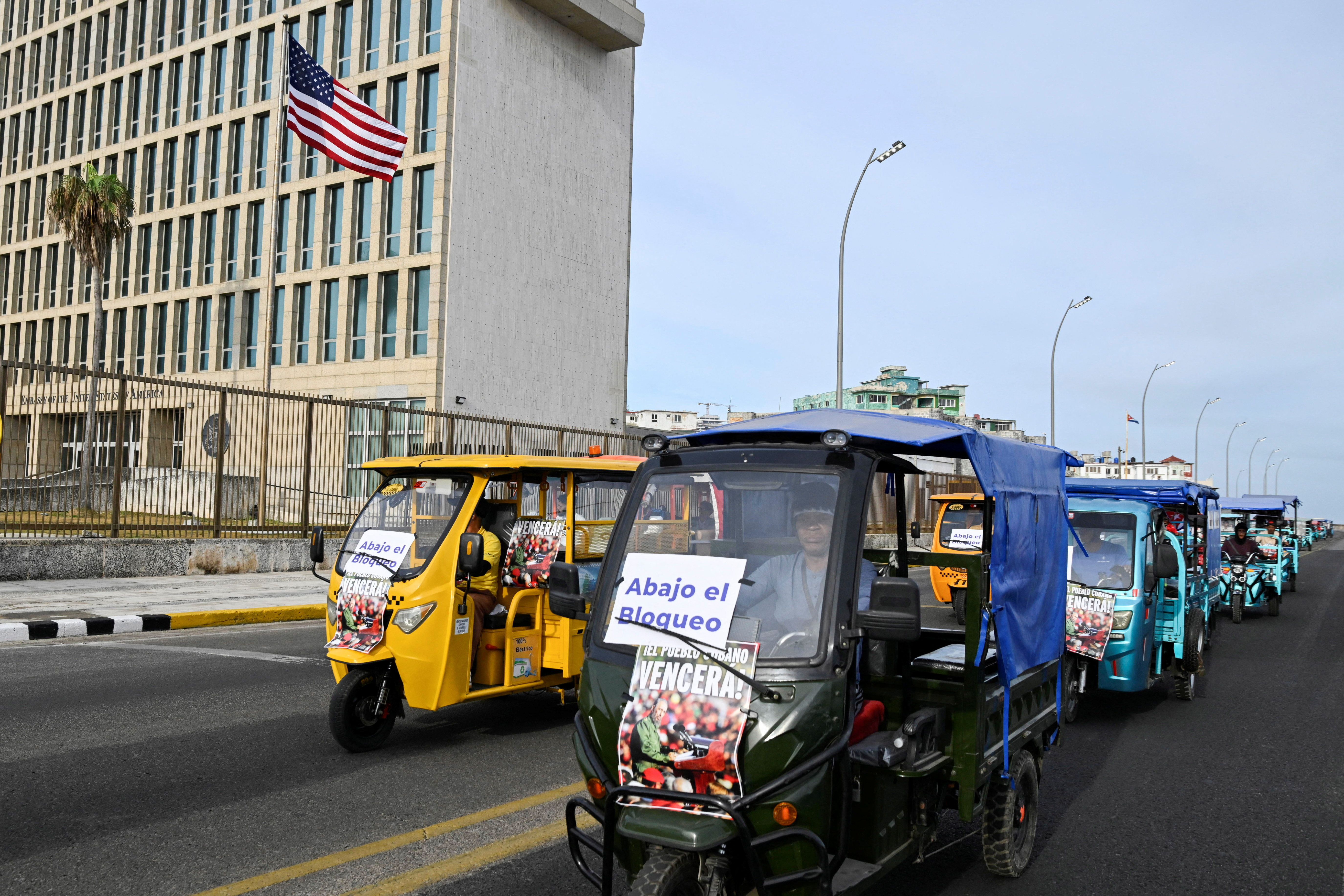 cover Cubans take to bikes and electric tricycles to protest US sanctions