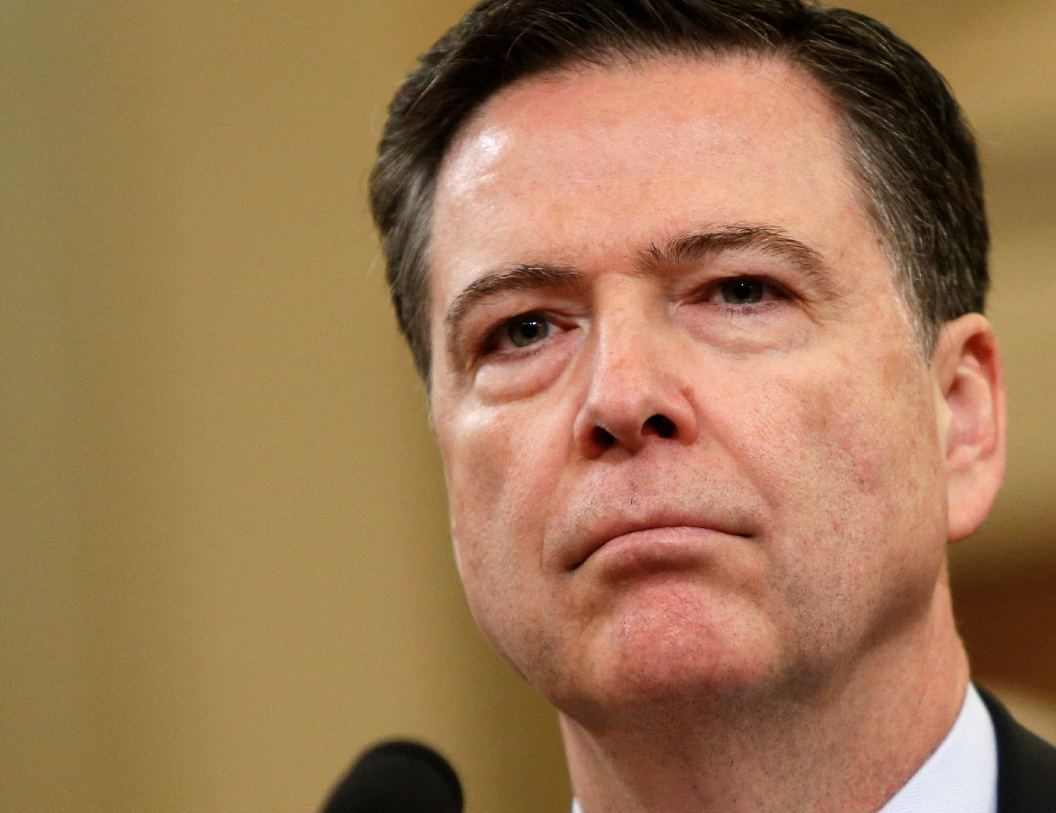 image Ex-FBI chief Comey released after court appearance on alleged Trump threat