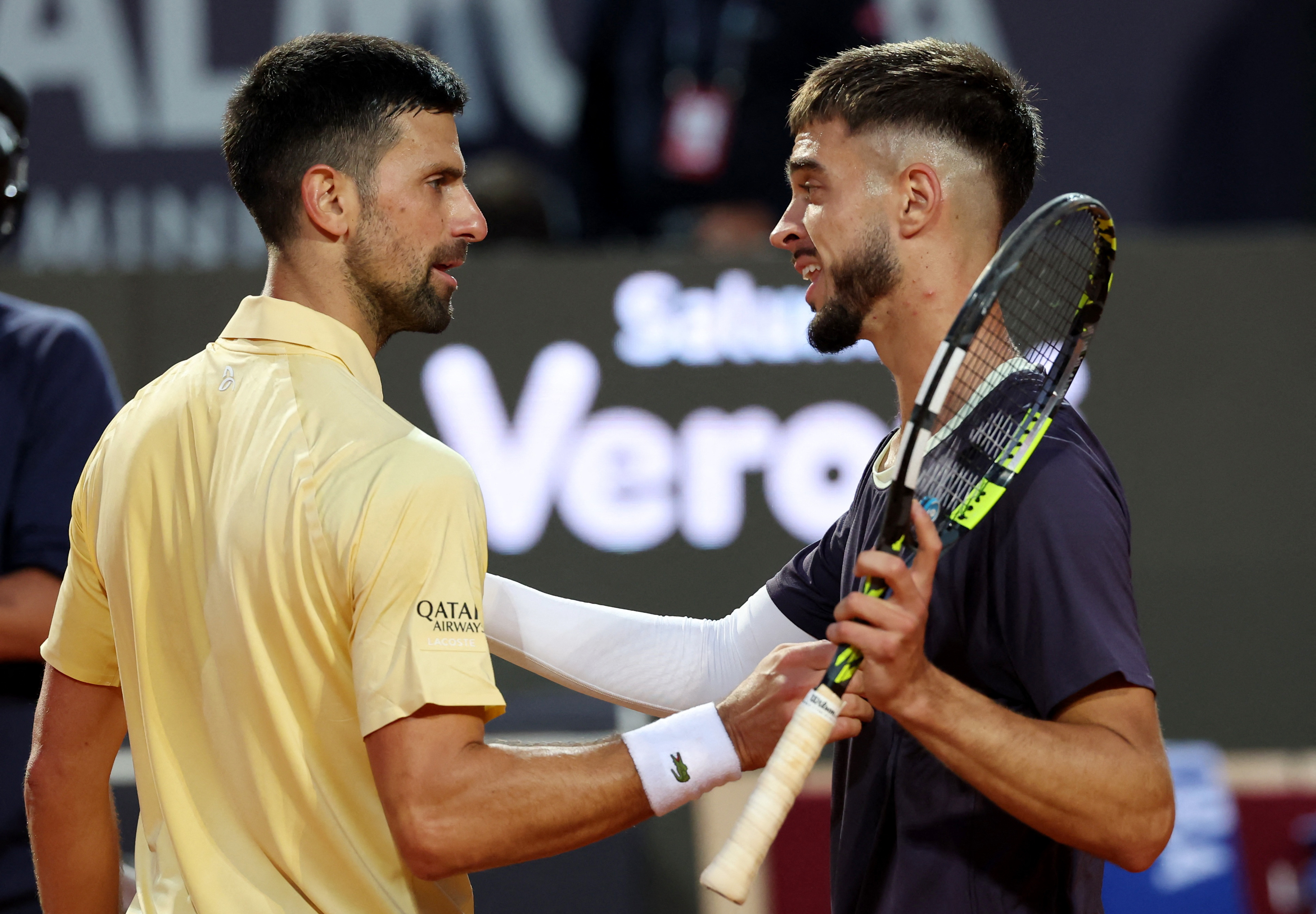 cover Prizmic stuns idol Djokovic at the Italian Open
