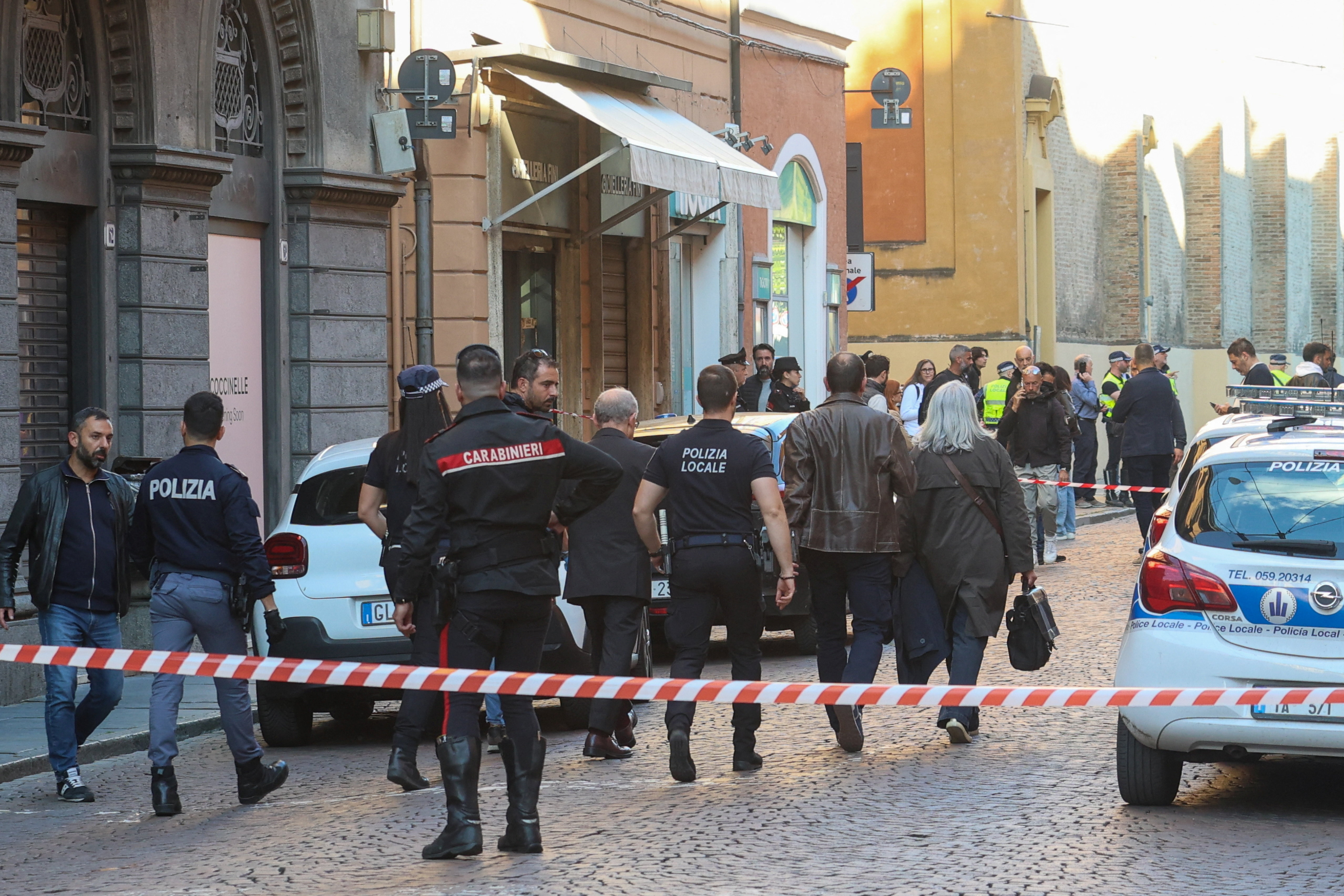cover At least eight injured as car rams into pedestrians in Italian city of Modena