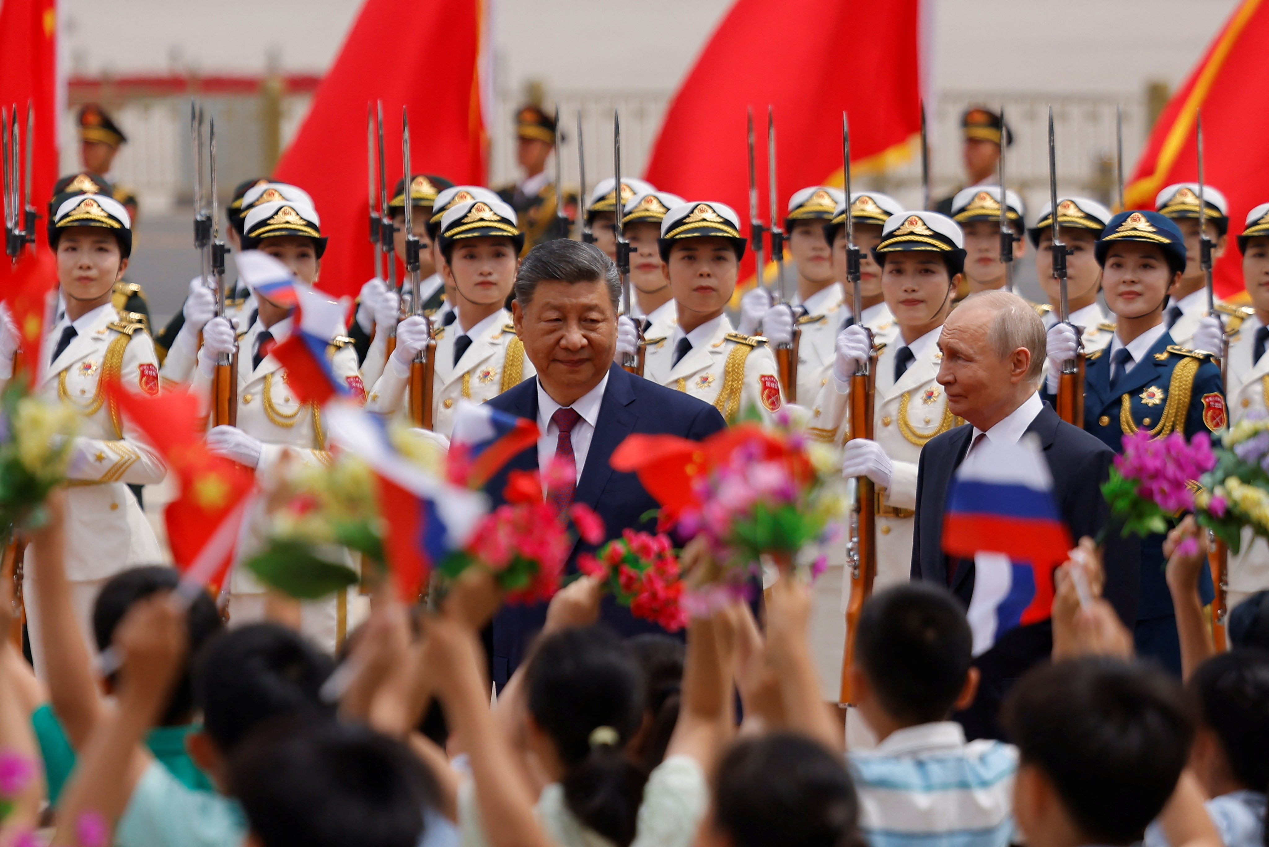 cover China, Russia leaders signal closer partnership in high-profile Beijing talks