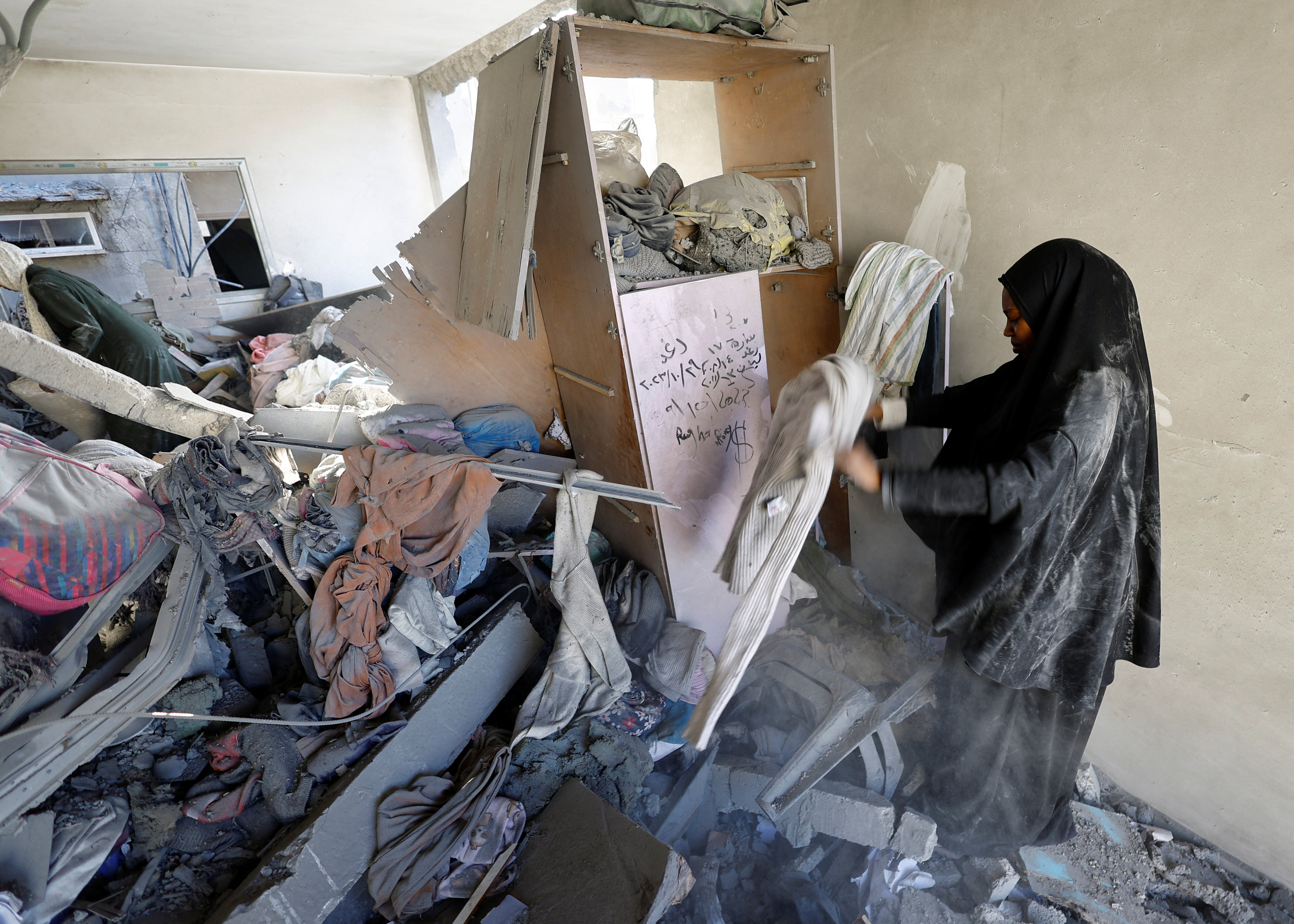 cover Israeli fire kills boy in Gaza as witnesses report increase in orders to flee