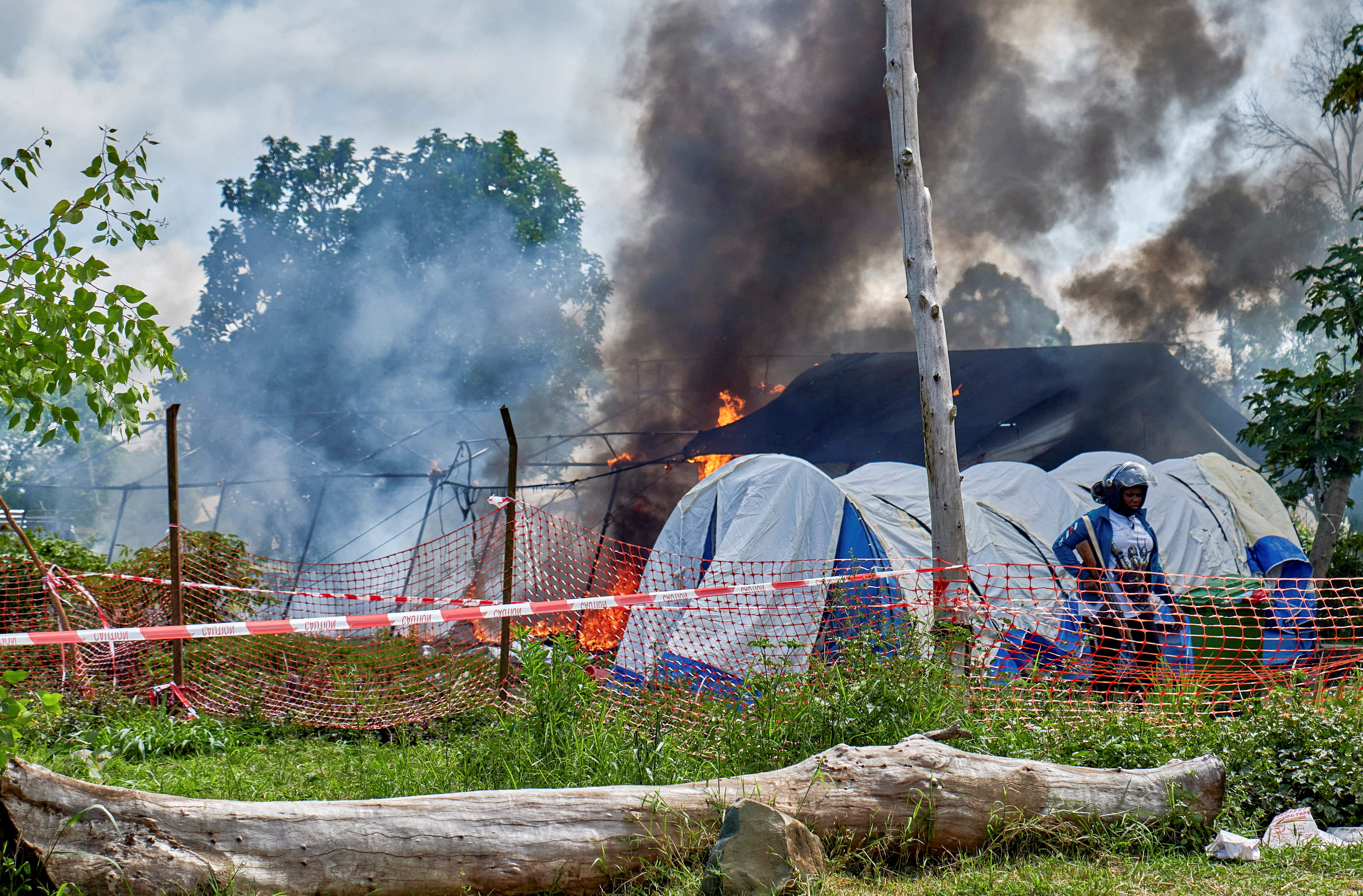 cover Congo police fire warning shots in burial dispute after suspected Ebola death