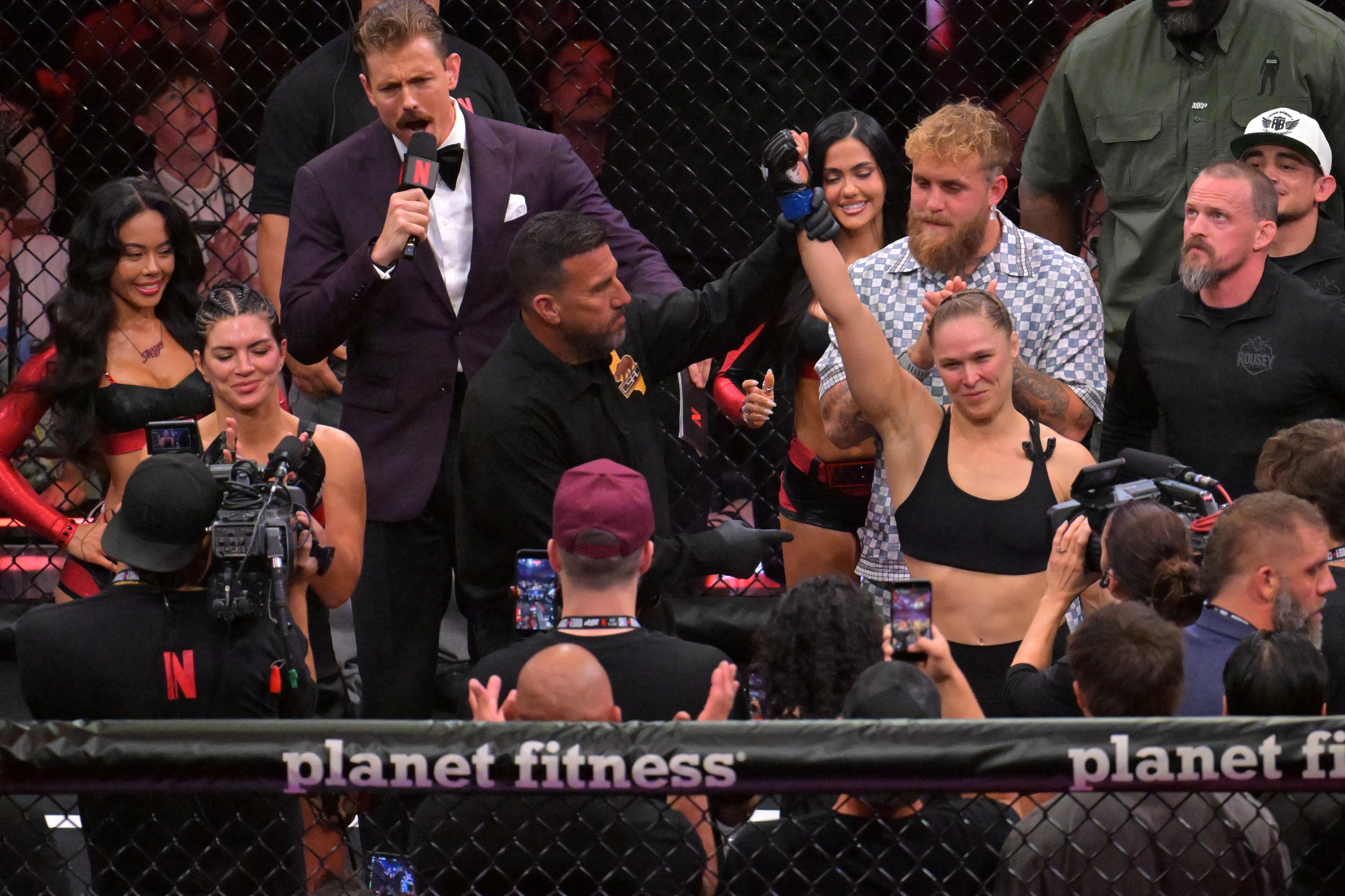 cover Ronda Rousey re-retires after 17-second submission defeat of Gina Carano
