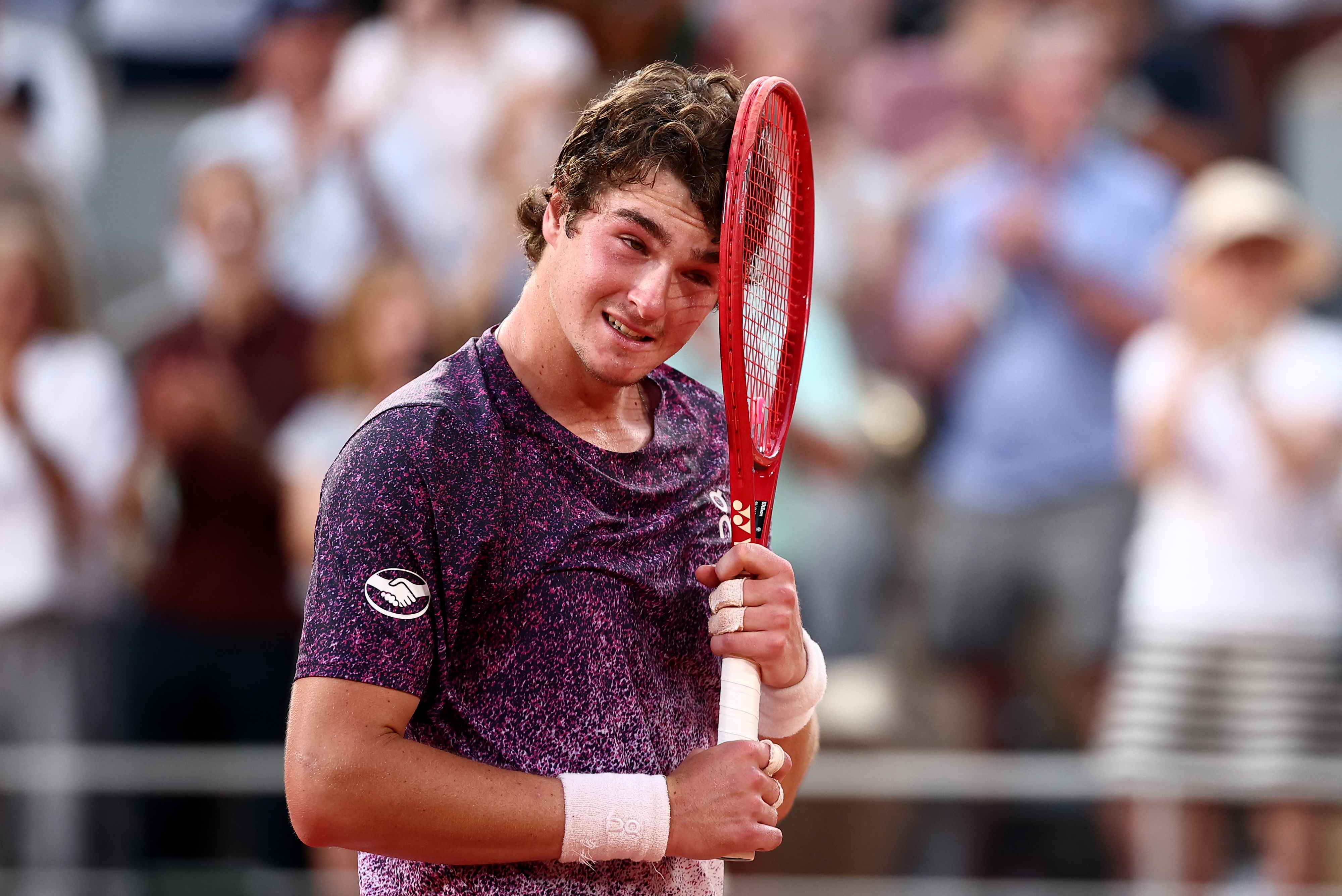 cover Teen sensation Fonseca comes of age by taming Djokovic at French Open