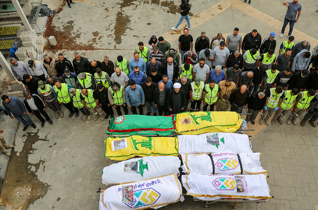cover Lebanese bury victims of deadliest Israeli strike since ceasefire