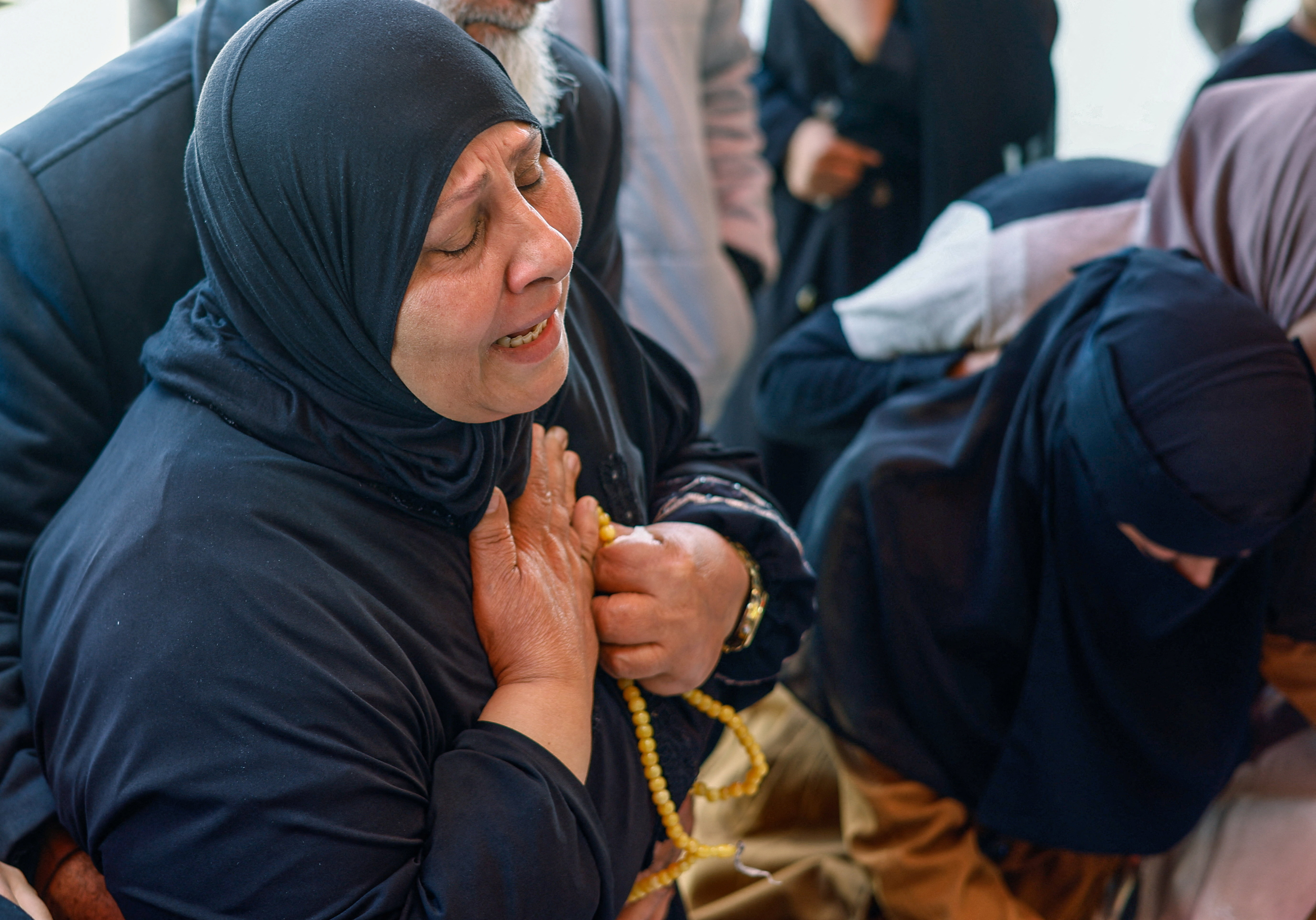 cover Israeli fire kills parents and their infant in Gaza, medics say