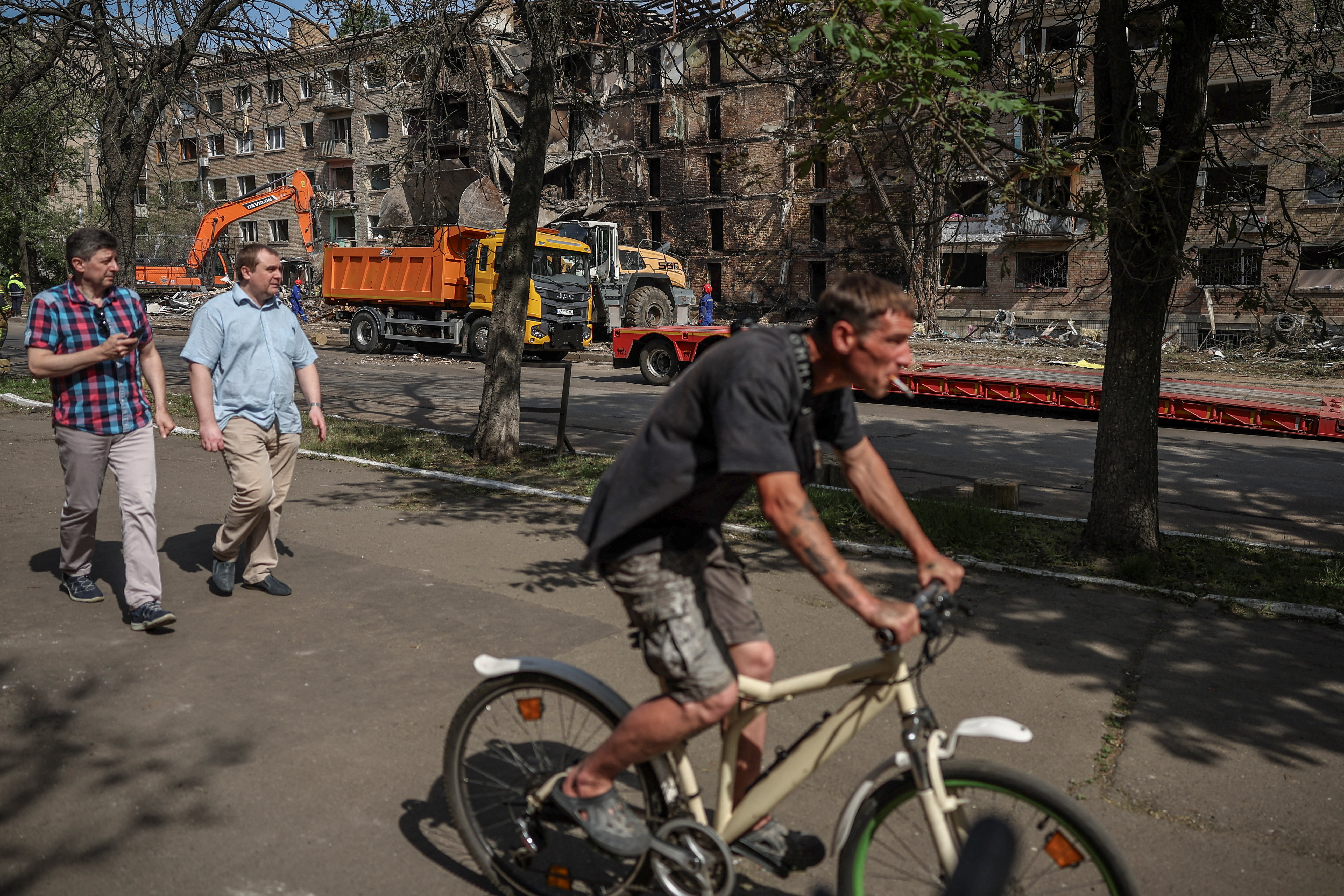 cover War-weary Kyiv residents defiant over Russian threat of new strikes